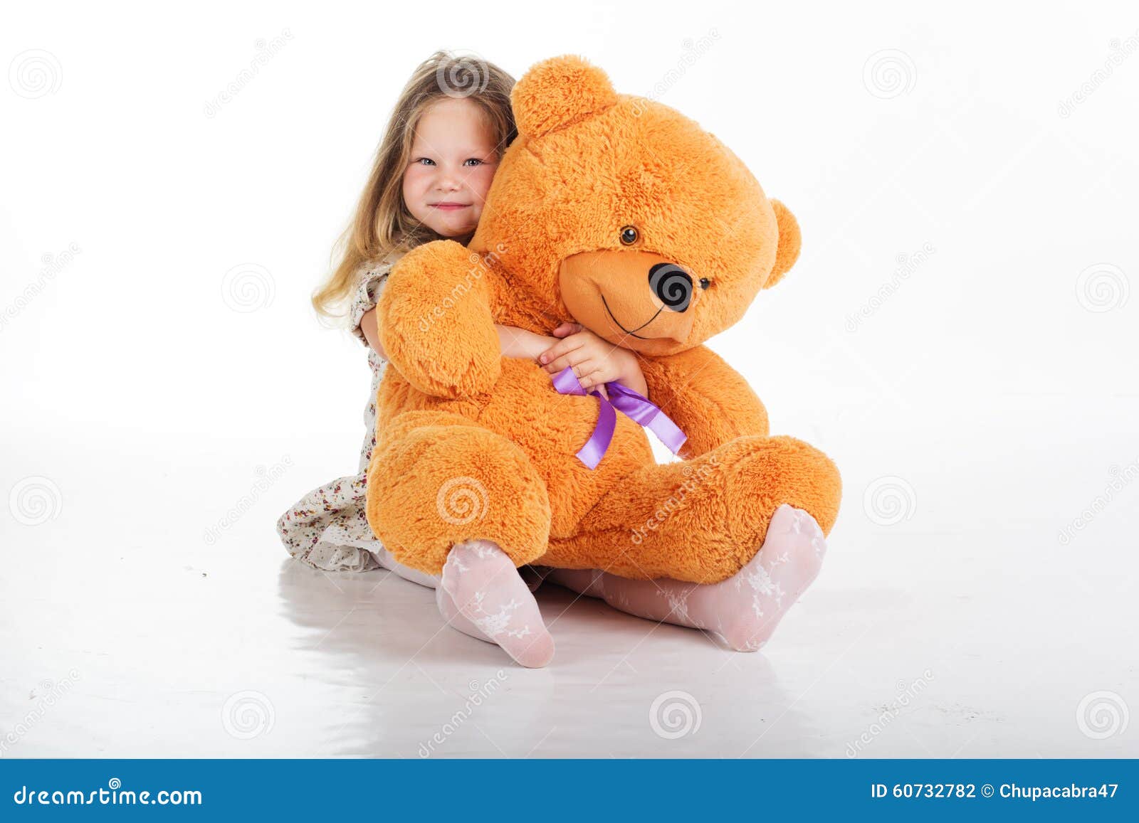 Child Girl is Hugging Her Teddy Bear Stock Photo - Image of looking ...