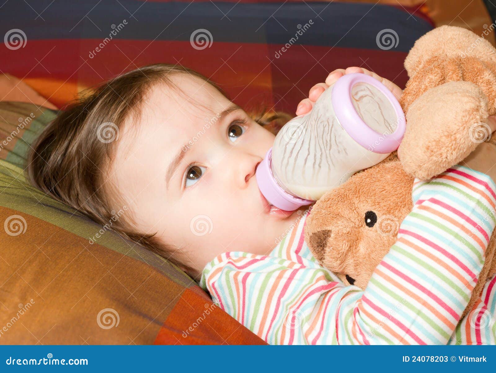 Child girl with <b>infant formula</b> in bottle - child-girl-infant-formula-bottle-24078203