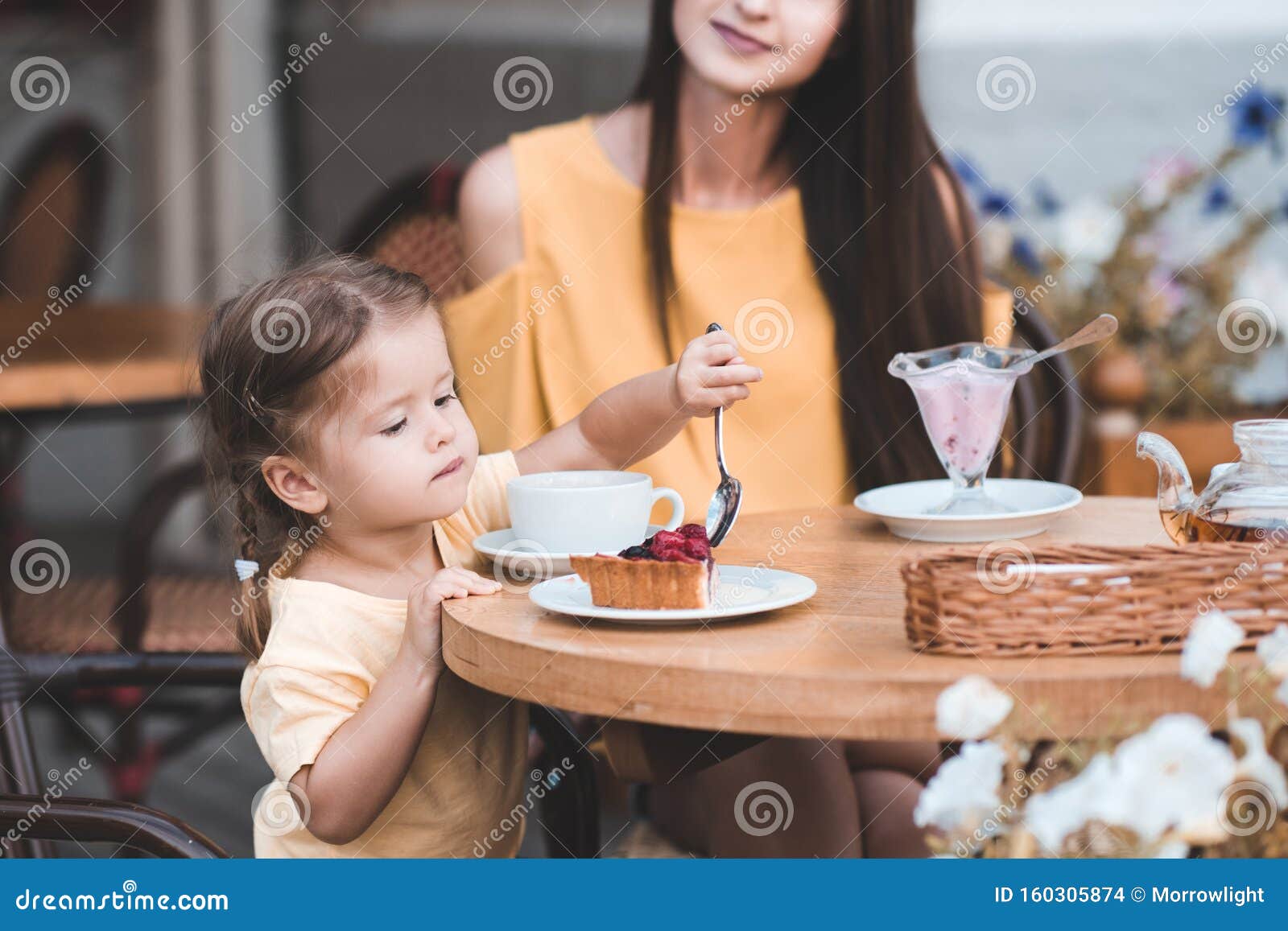 Child Girl with Mother in Cafe Stock Photo - Image of maternity ...