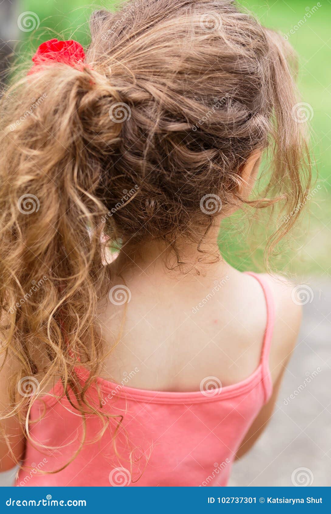 Child Girl Outside With Long Curly Hair Back View Stock