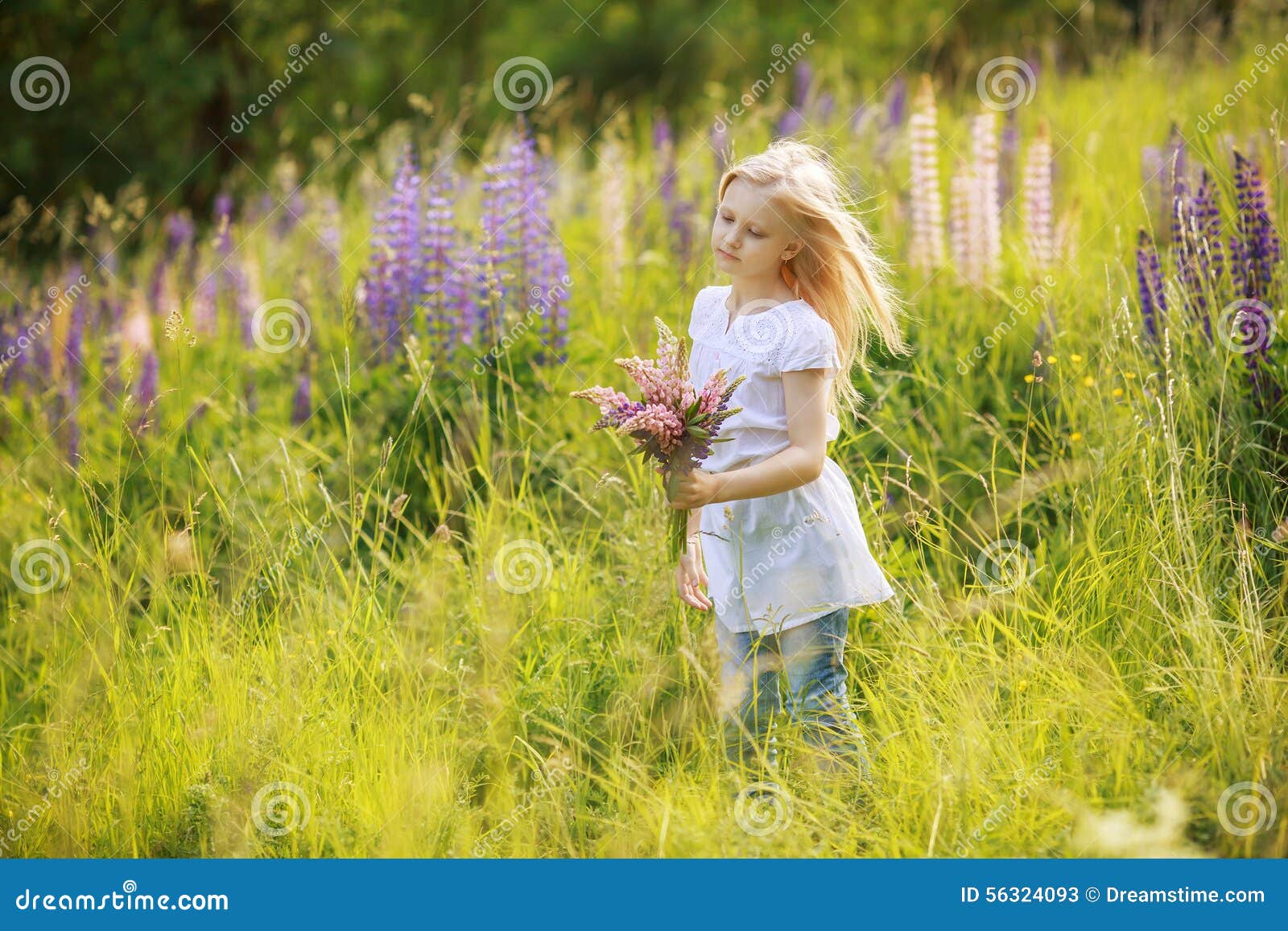 Child girl picking flowers stock image. Image of nature 56324093
