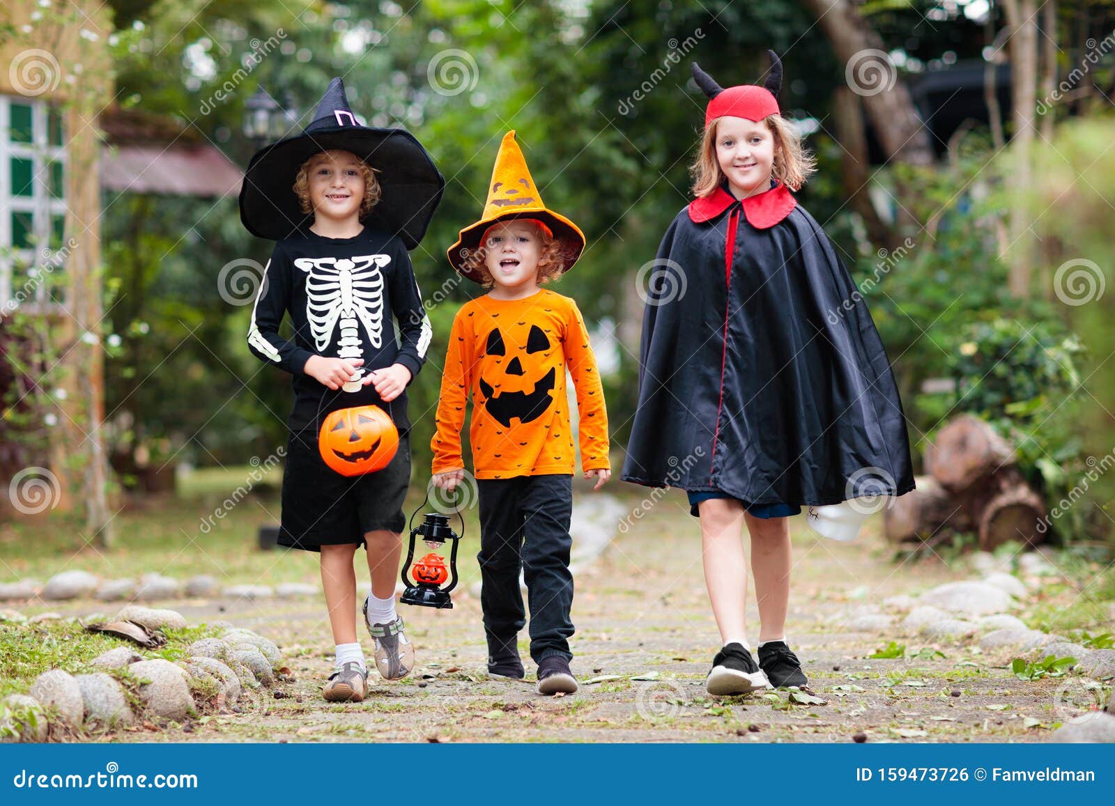 Kids Trick or Treat. Halloween Fun for Children Stock Photo - Image of  candy, outdoors: 159473726