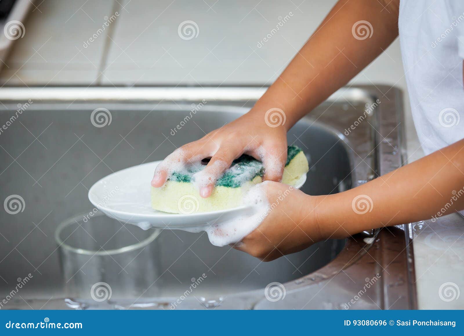 Child Hand Washing Dishes Over the Sink Stock Photo Image of home