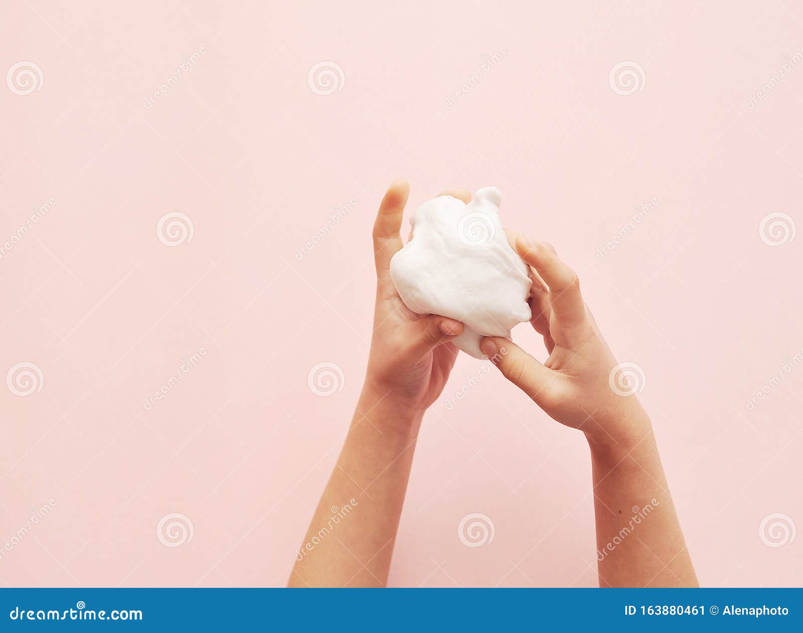 White Slime in Child Hands on Pink Background. Stock Image - Image of blue,  little: 163880461