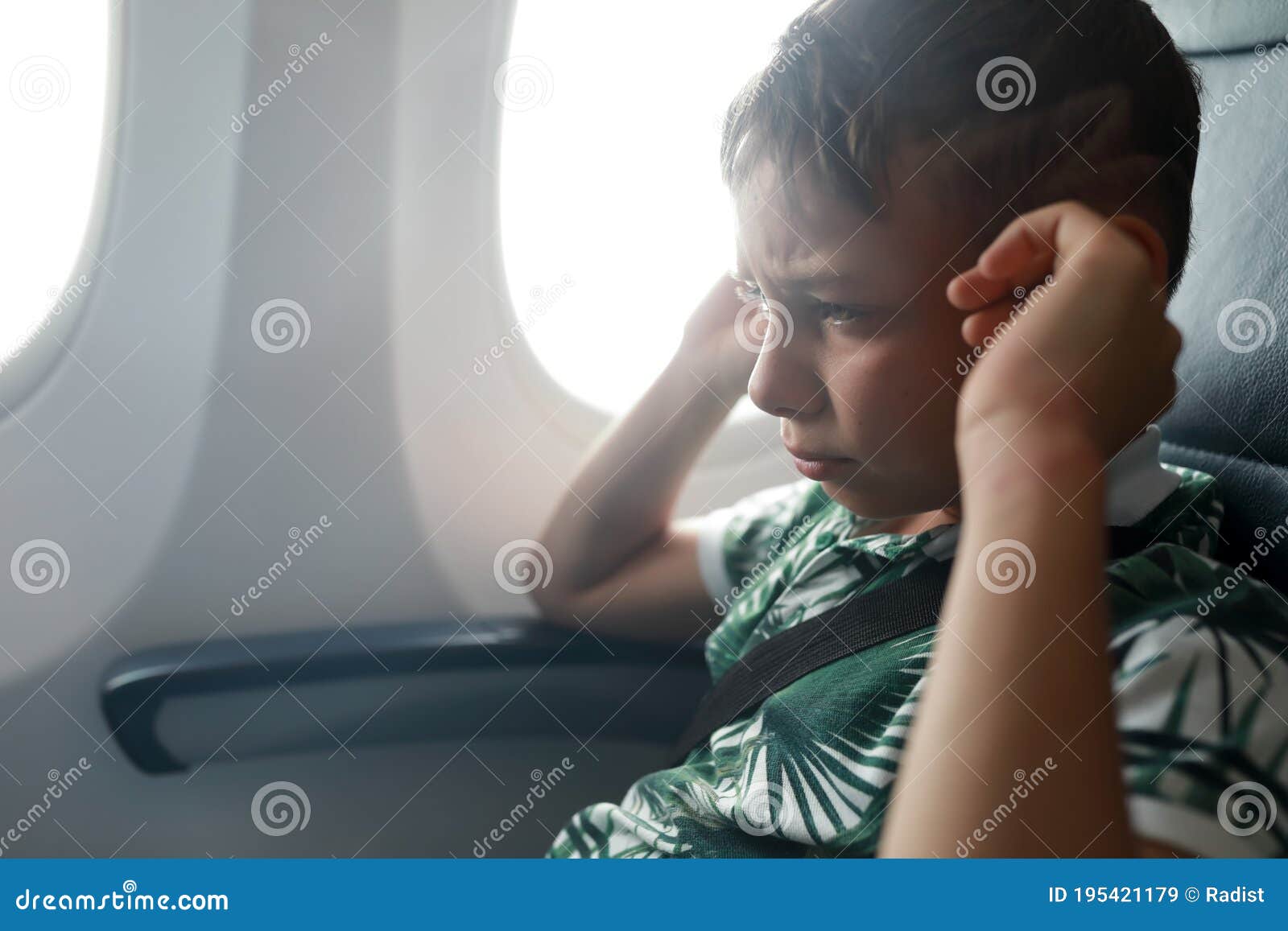 Child Has Ear Pains about Plane Landing Stock Image Image of