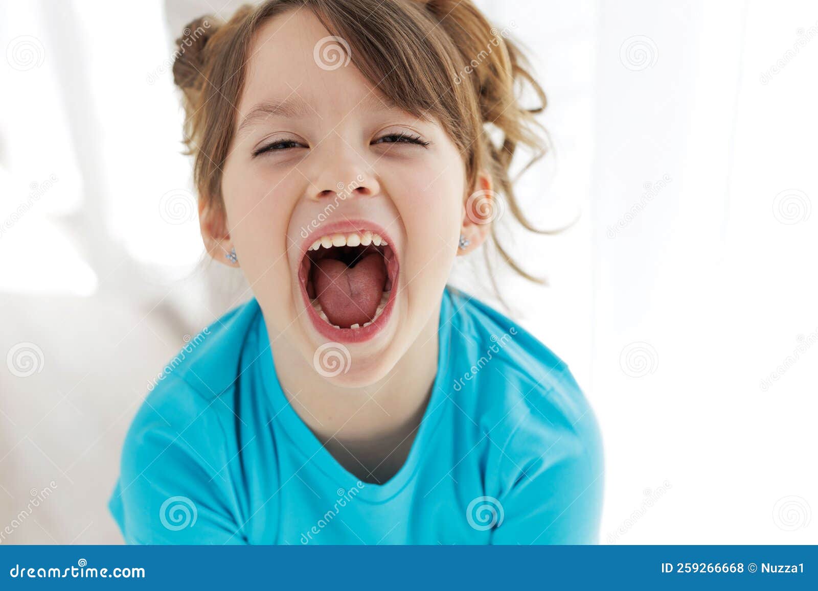 The Child Has Lost a Tooth. Little Girl without a Tooth. the First