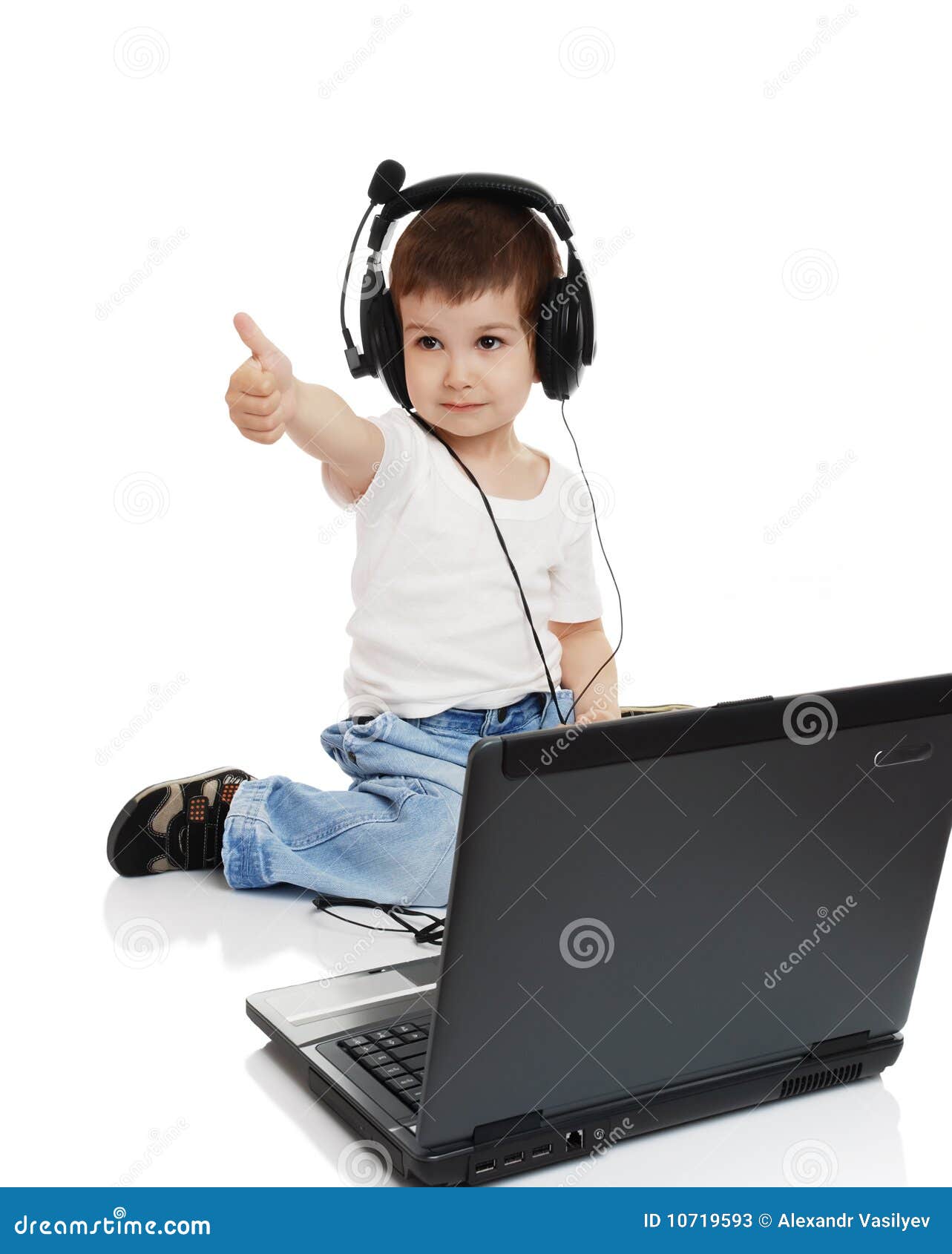 The child in headphones stock image. Image of sound, background 10719593
