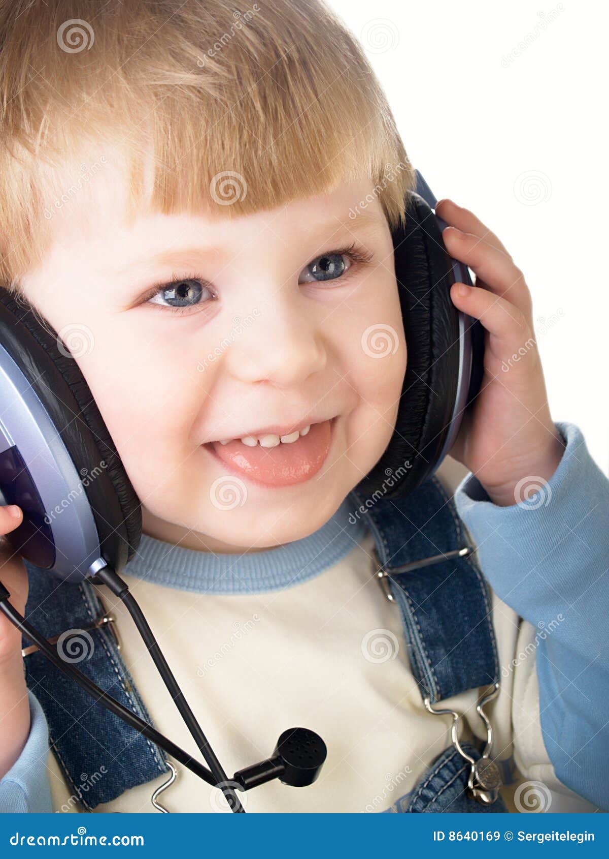 The child in headphones stock image. Image of sing, cute 8640169