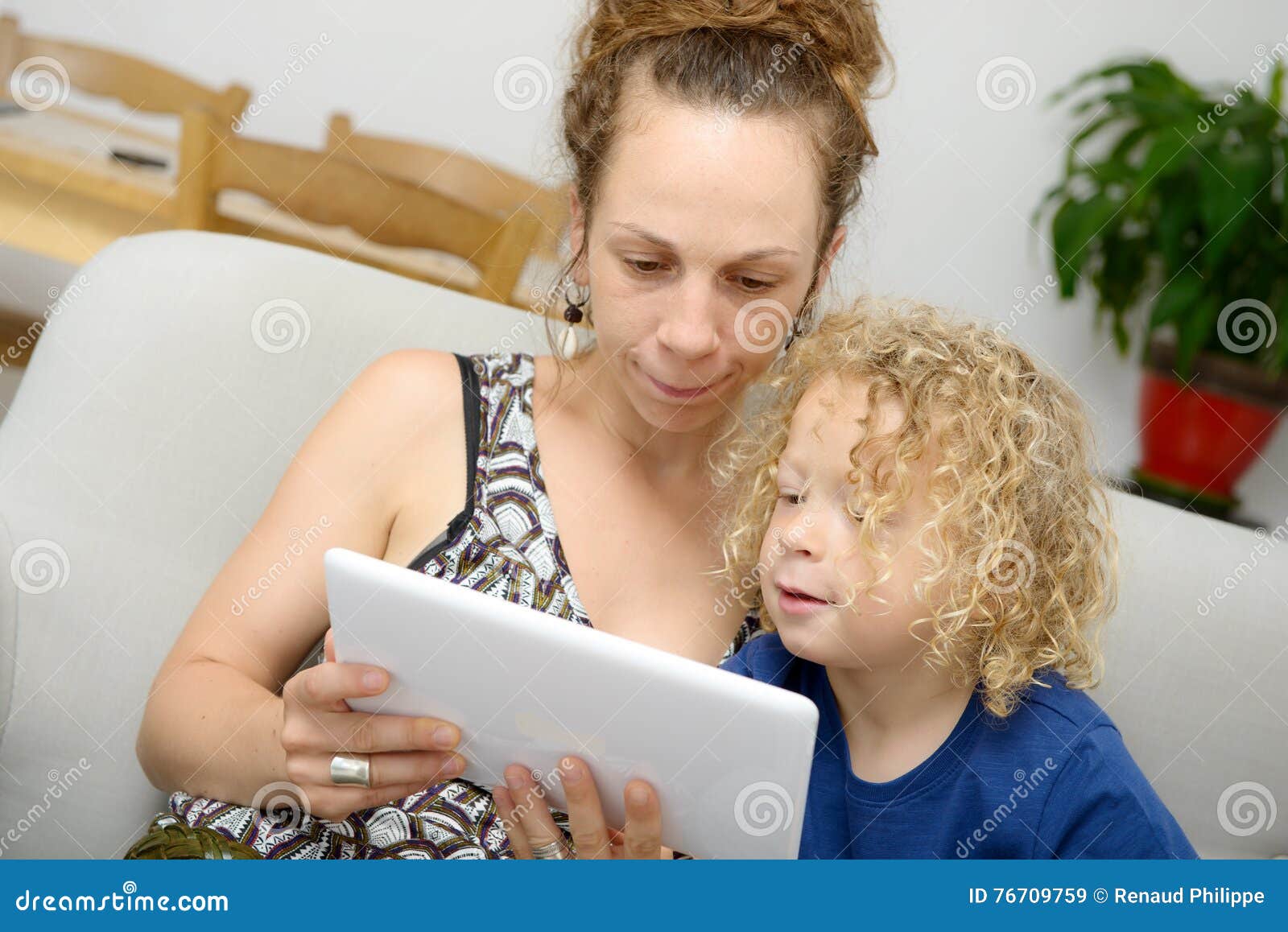 A Child and Her Mom Uses a Tablet Stock Image Image of application