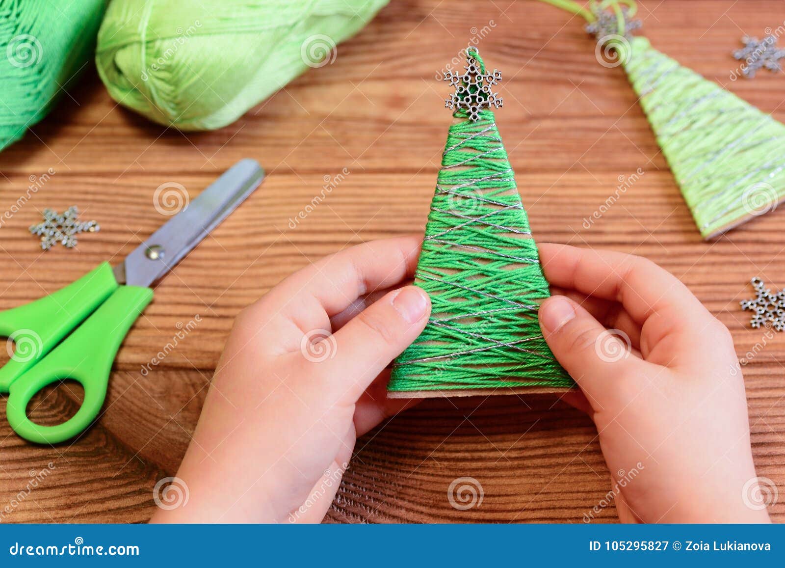 Child Is Holding A Christmas Tree Decoration In His Hands Child Is Showing A Christmas Tree Decoration Easy Recycled Crafts Stock Image Image Of Cheap Handing 105295827