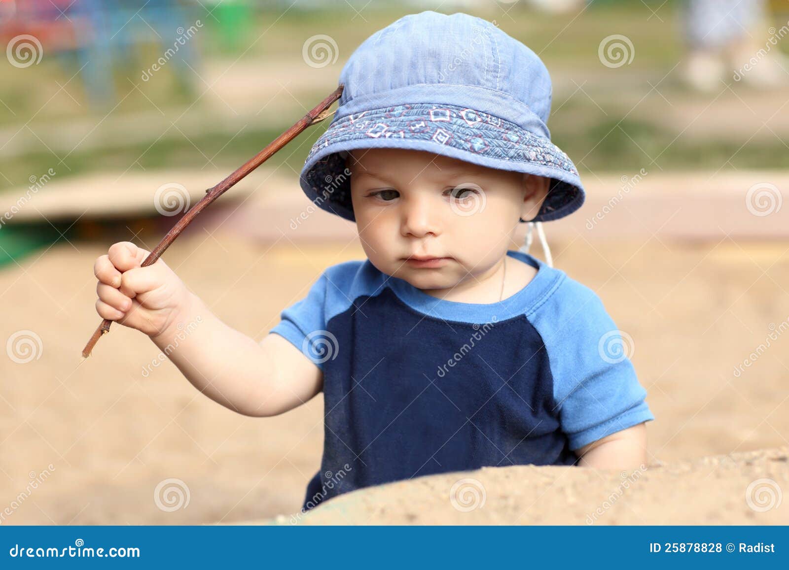 Child holding stick stock photo. Image of dirt, person 25878828