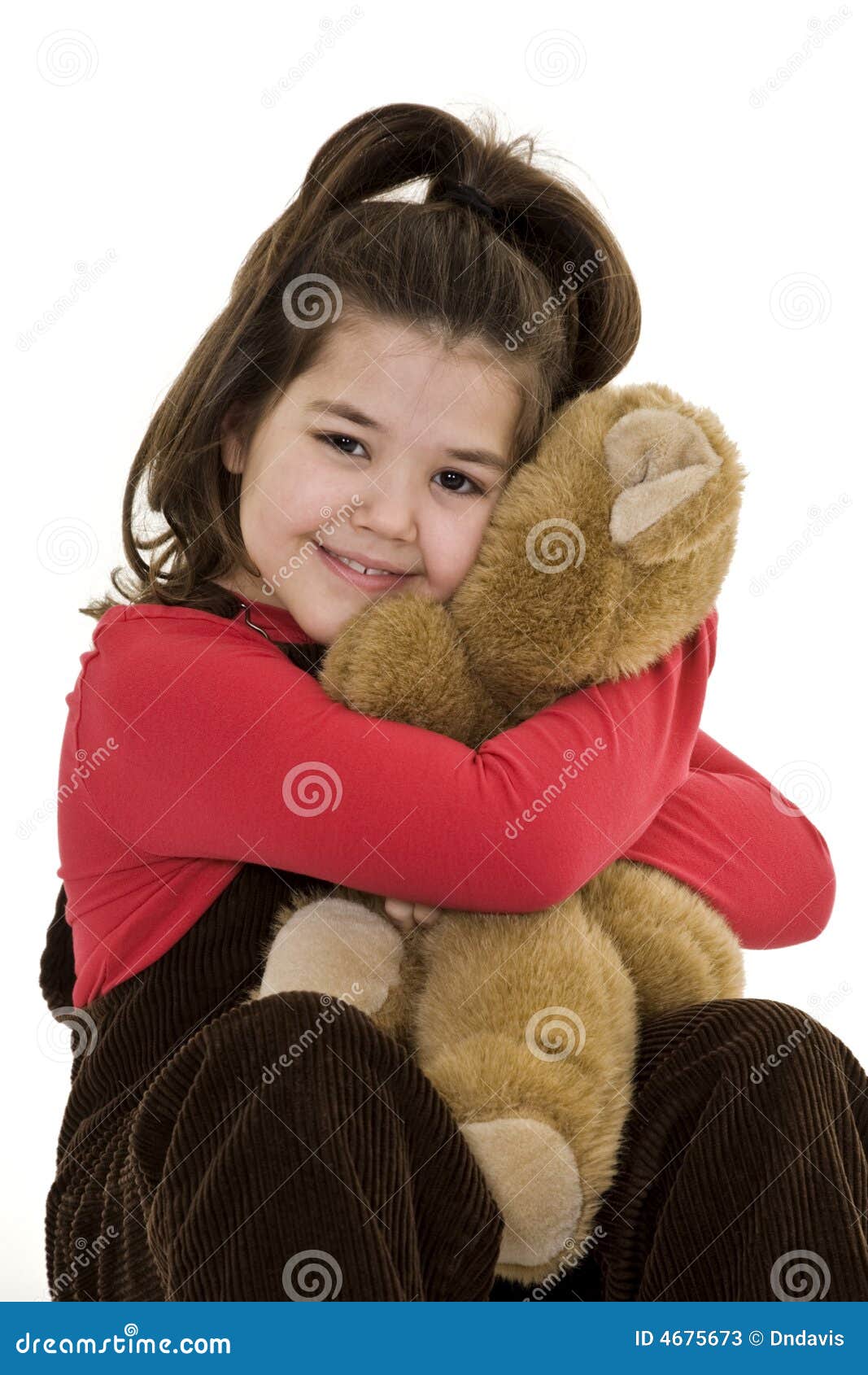 Child holding teddy bear stock image. Image of smiling 4675673
