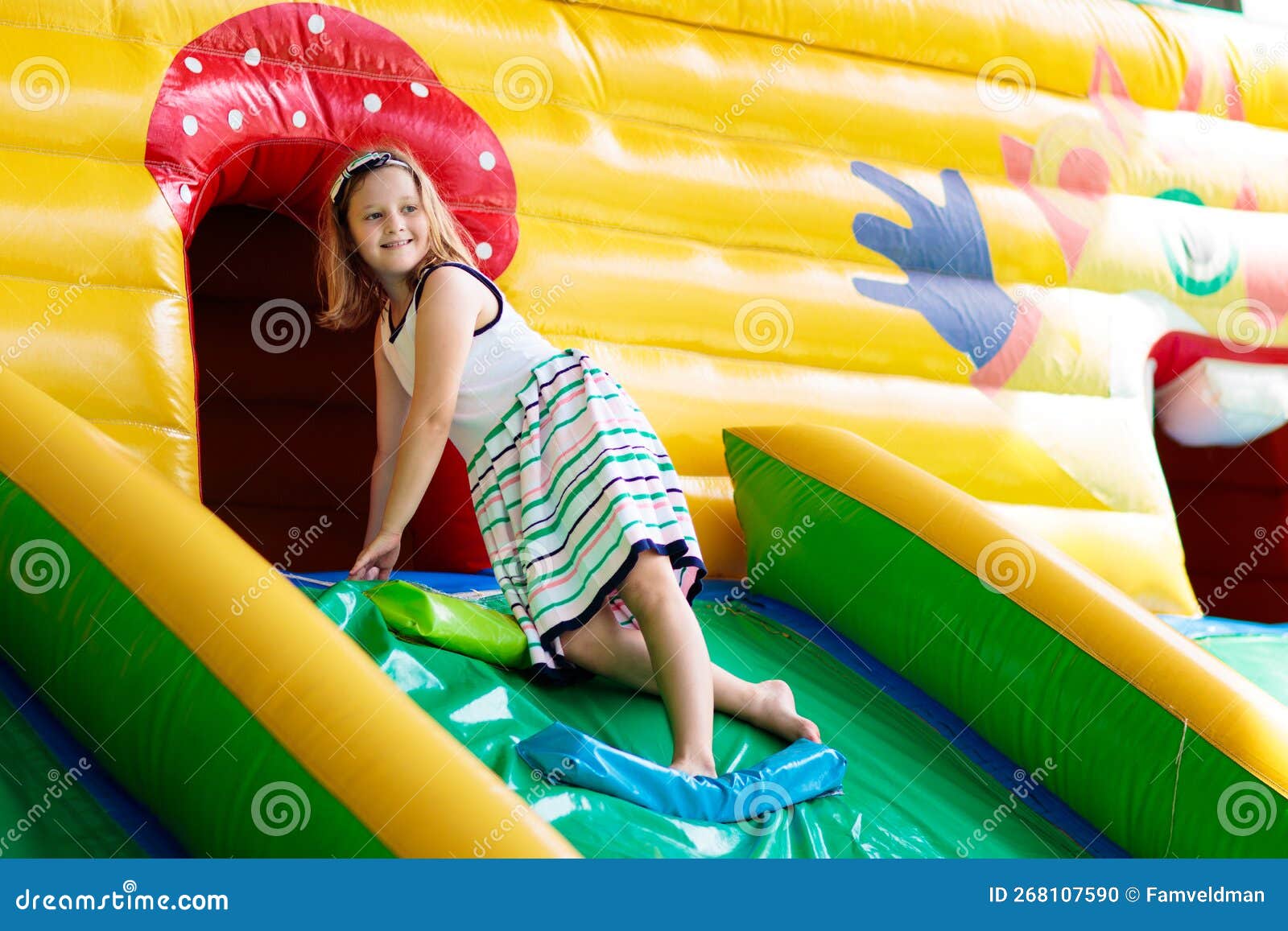 Child Jumping on Playground Trampoline. Kids Jump Stock Photo Image