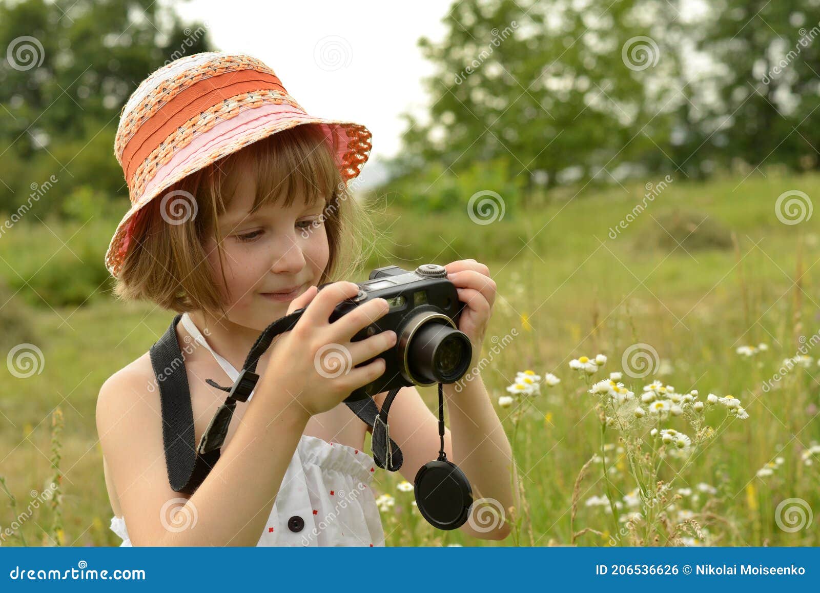 Child, Kid Photographer a Little Girl with a Camera on the ...