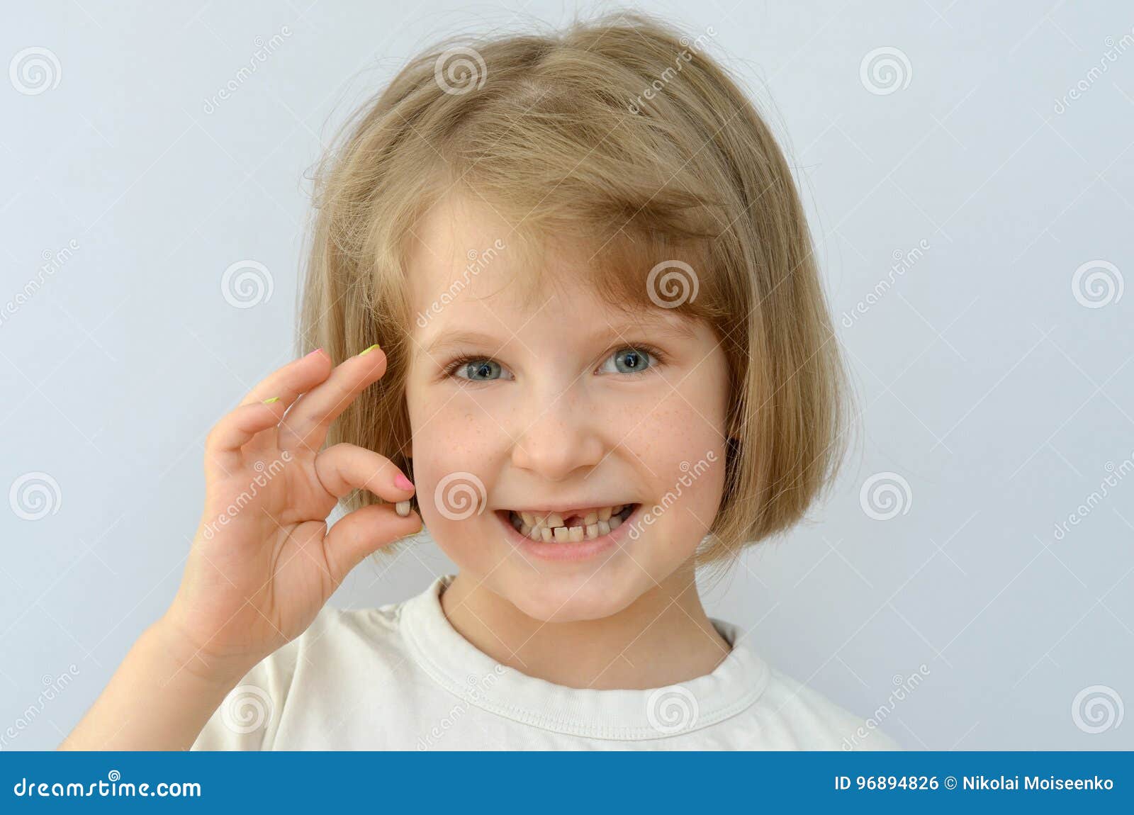 Child, Kid, Shows the Fallen Baby Tooth. Stock Photo Image of