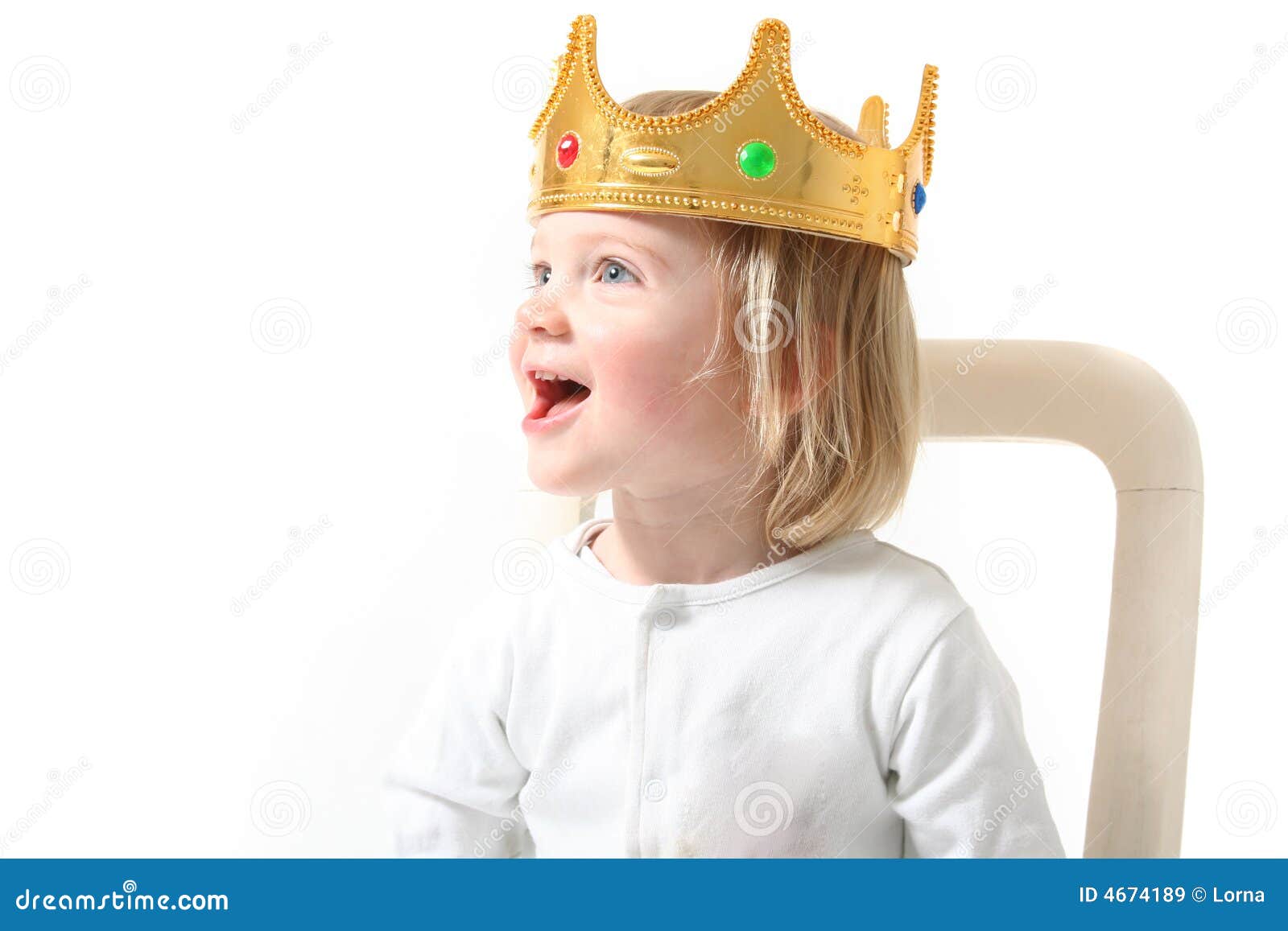 Child is king. Toddler or child with kings crown. blond Boy laughing and dressed up