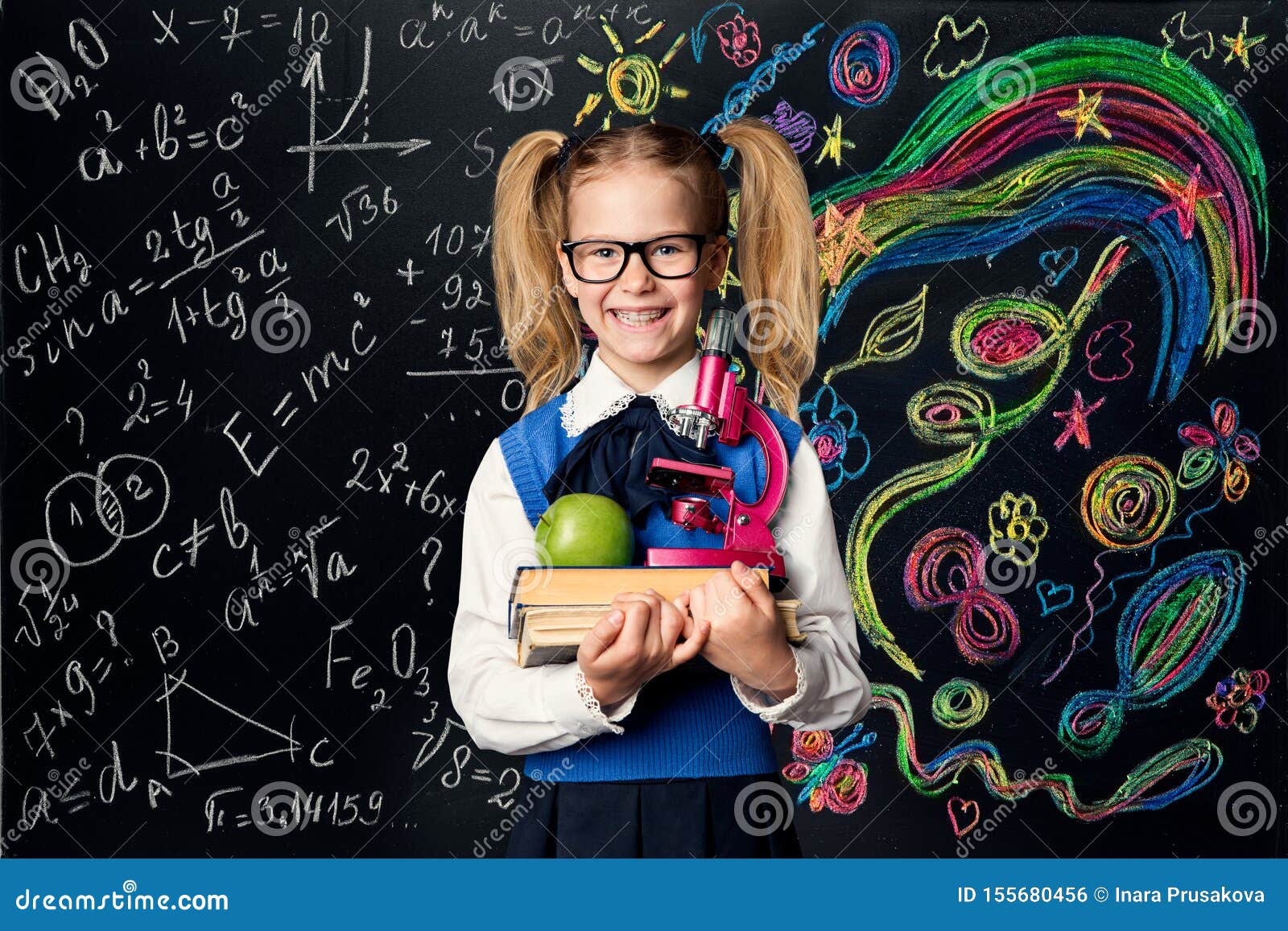 child learning creativity and mathematics, creative school kid girl student with books over art blackboard