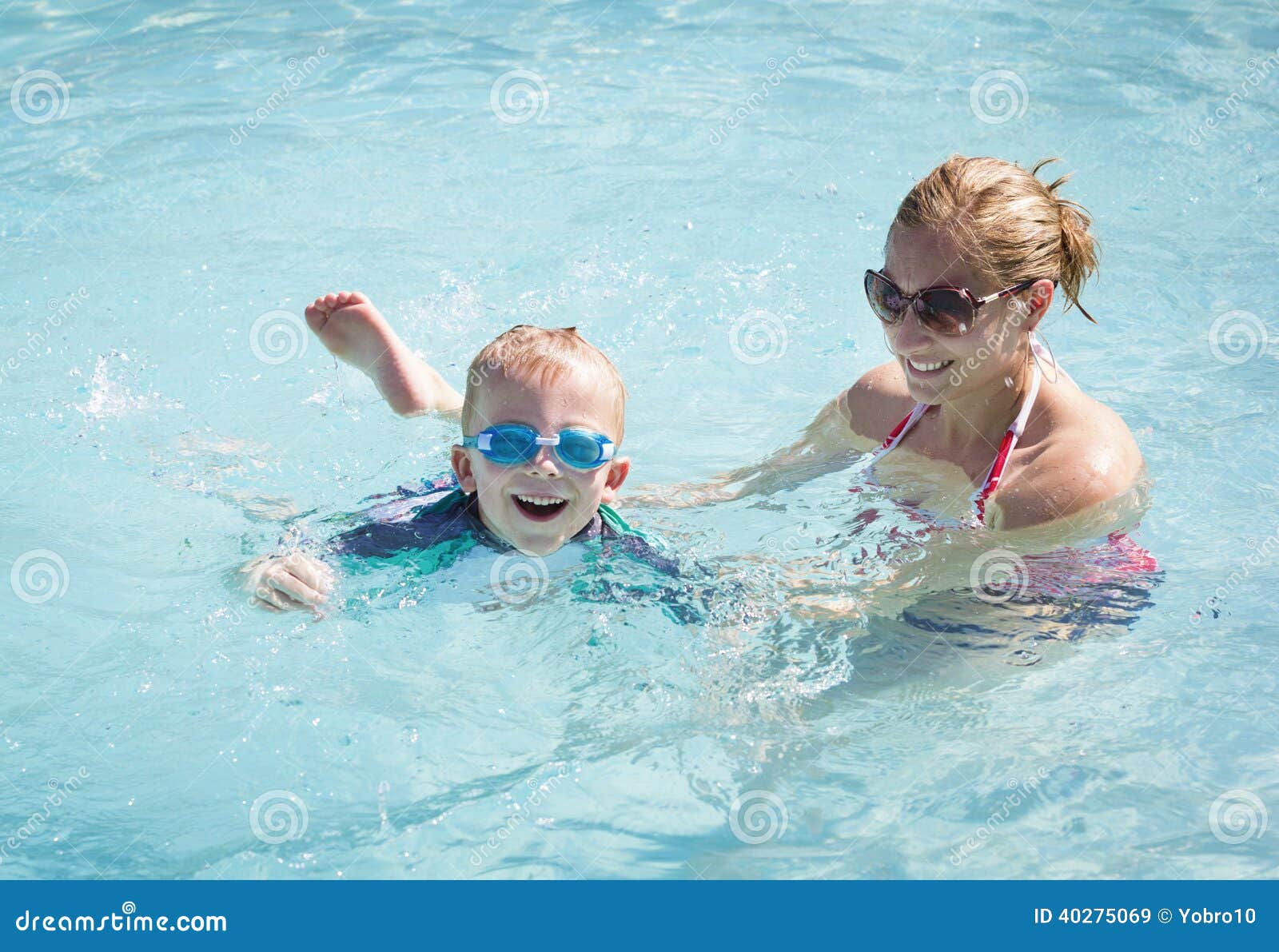 child learning to swim