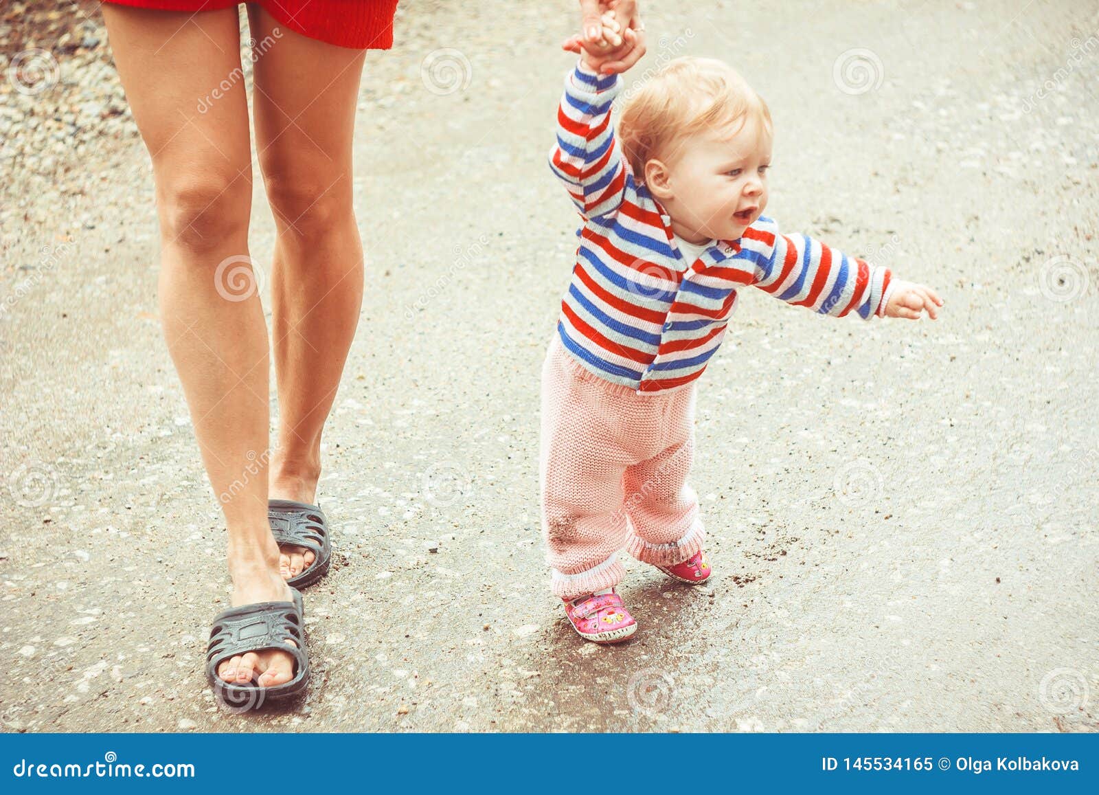 The Child Learns To Walk on the Grass Stock Image Image of care