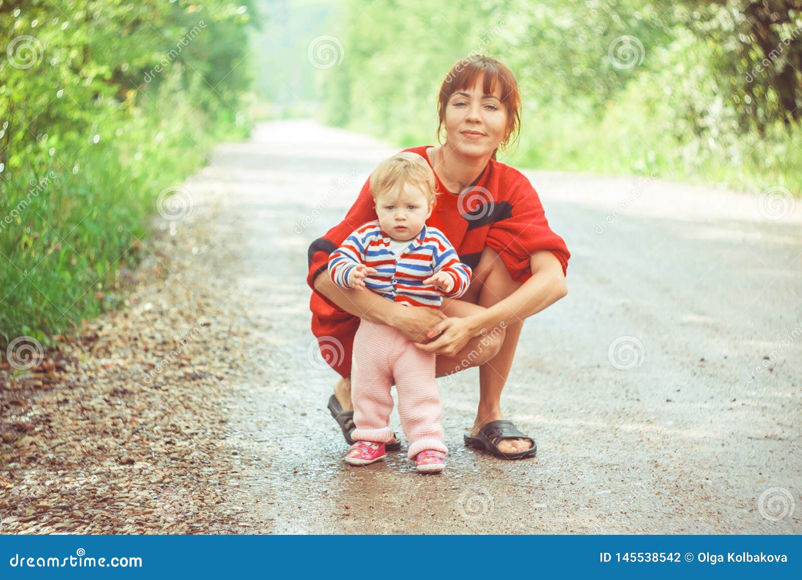 The Child Learns To Walk on the Grass Stock Photo Image of learning