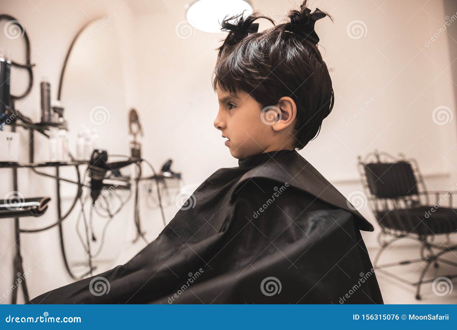 Barbershops put books in hands of kids getting haircuts