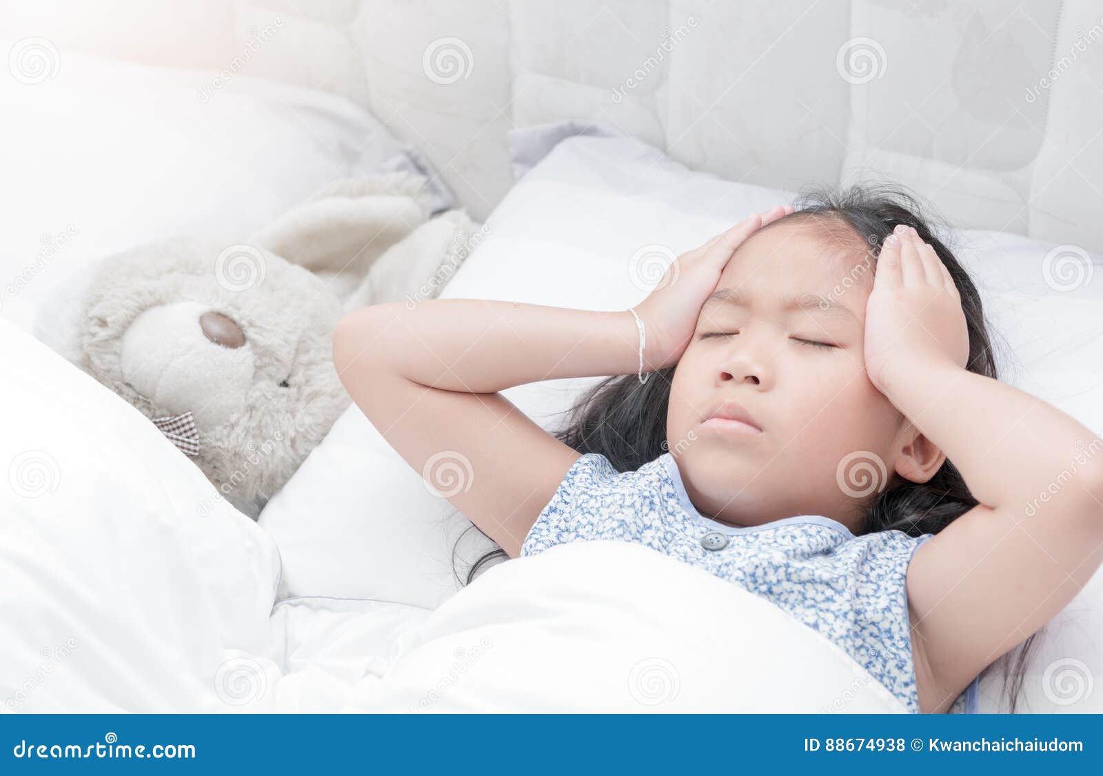 Child Lying Down Suffering from a Headache Stock Photo Image of