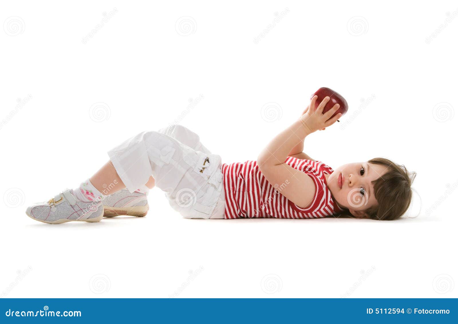 Child lying on the floor stock photo. Image of happy, giggle 5112594