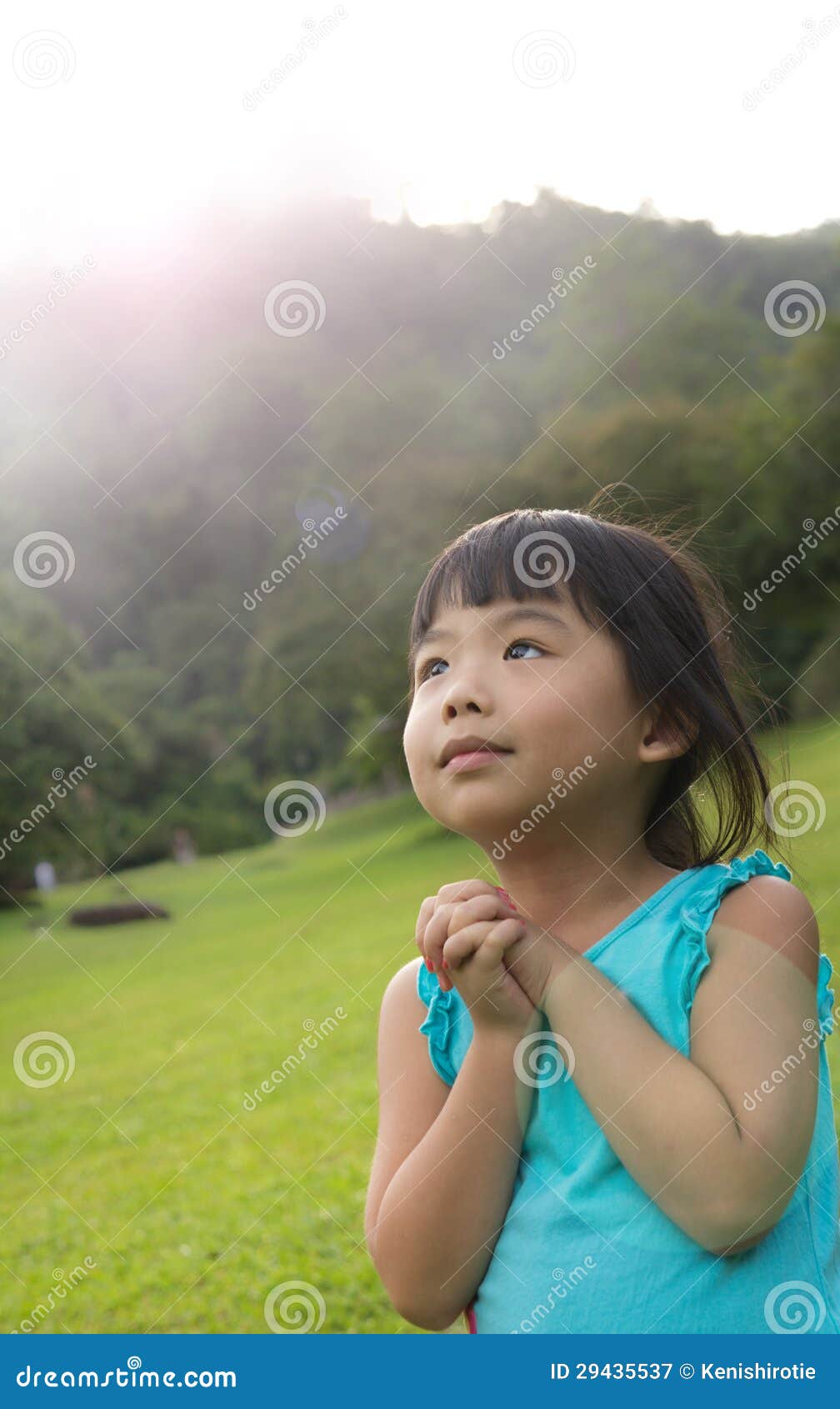 Child is making wish stock image. Image of backlit, portrait 29435537