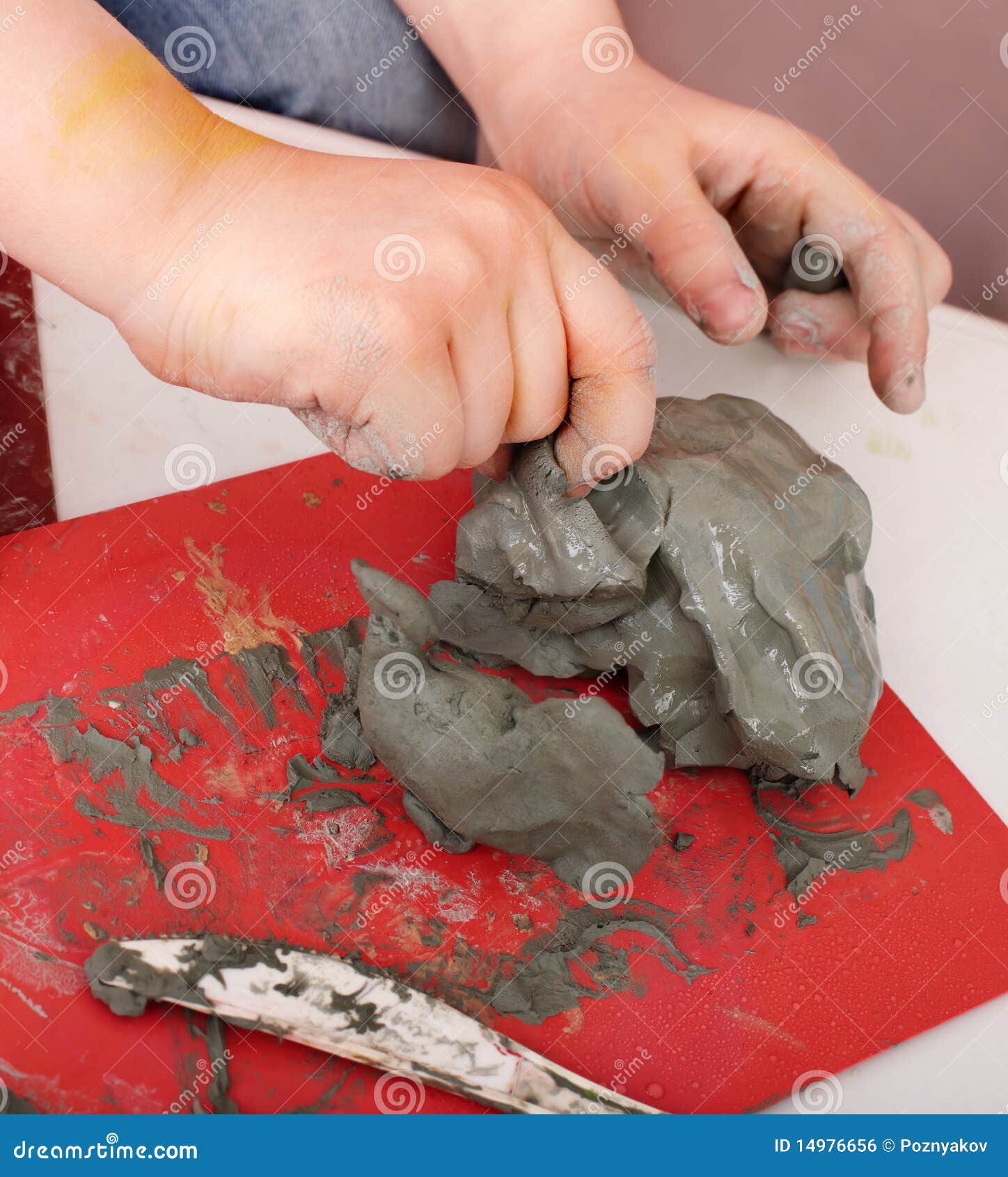 Child Moulding from Clay in Play Room. Stock Photo Image of education