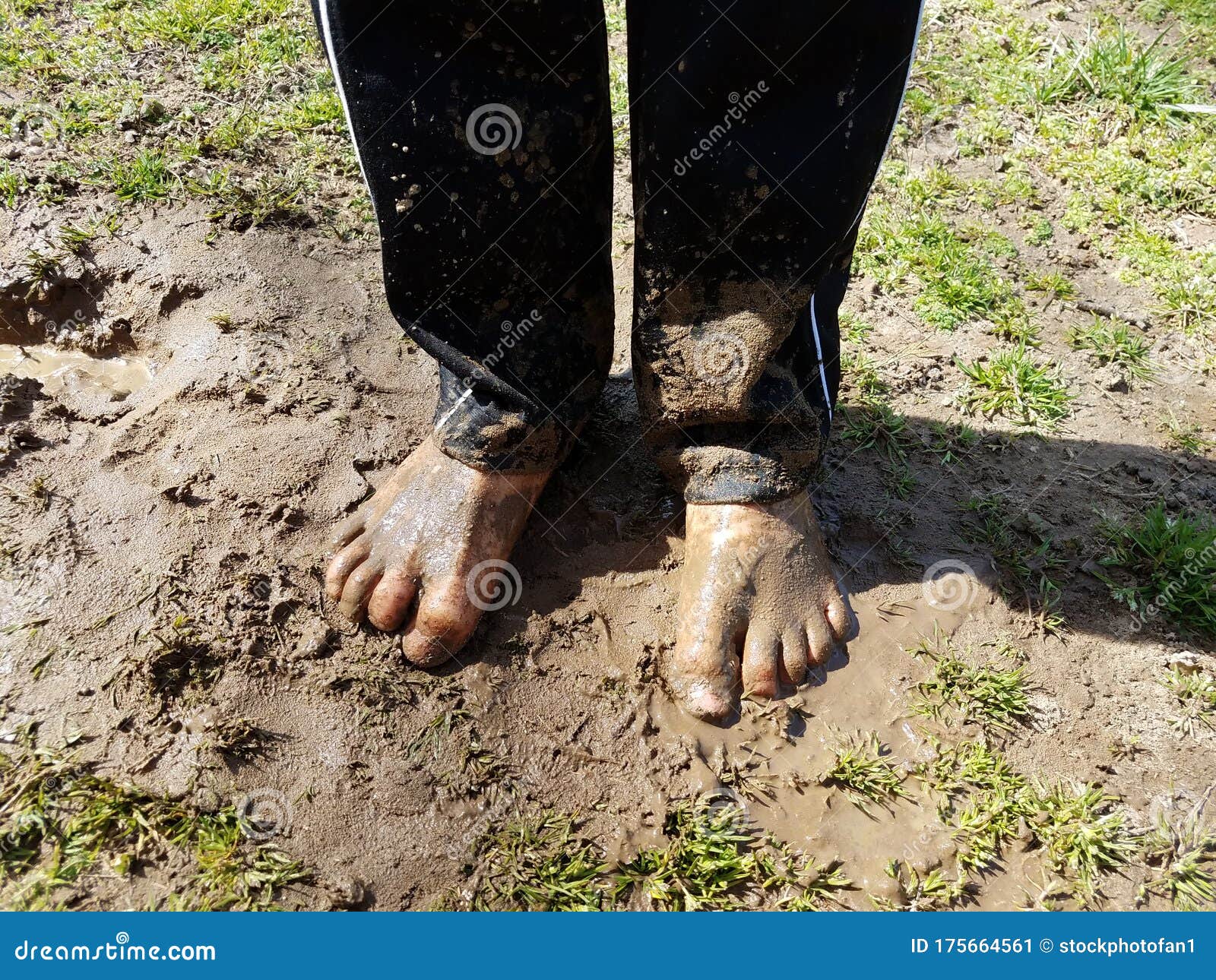 Child with Muddy Feet and Mud and Grass Stock Image - Image of toes ...