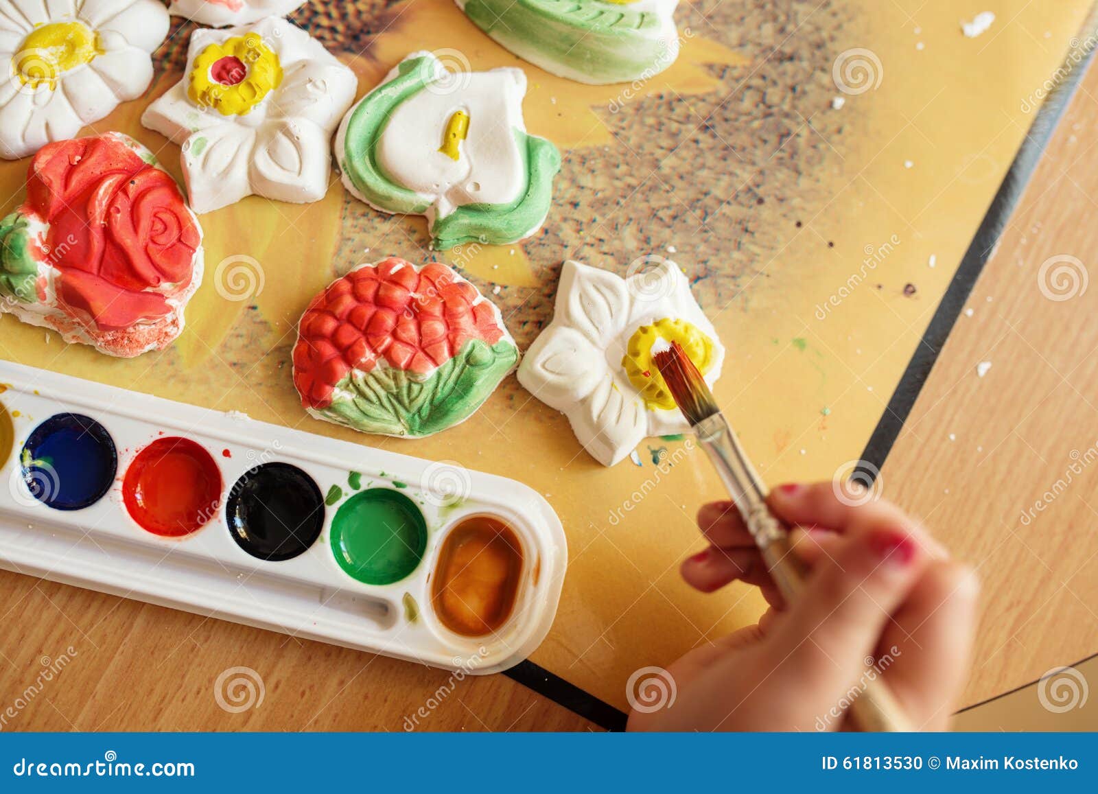 Child Painting a Ceramic Pottery Stock Photo Image of education