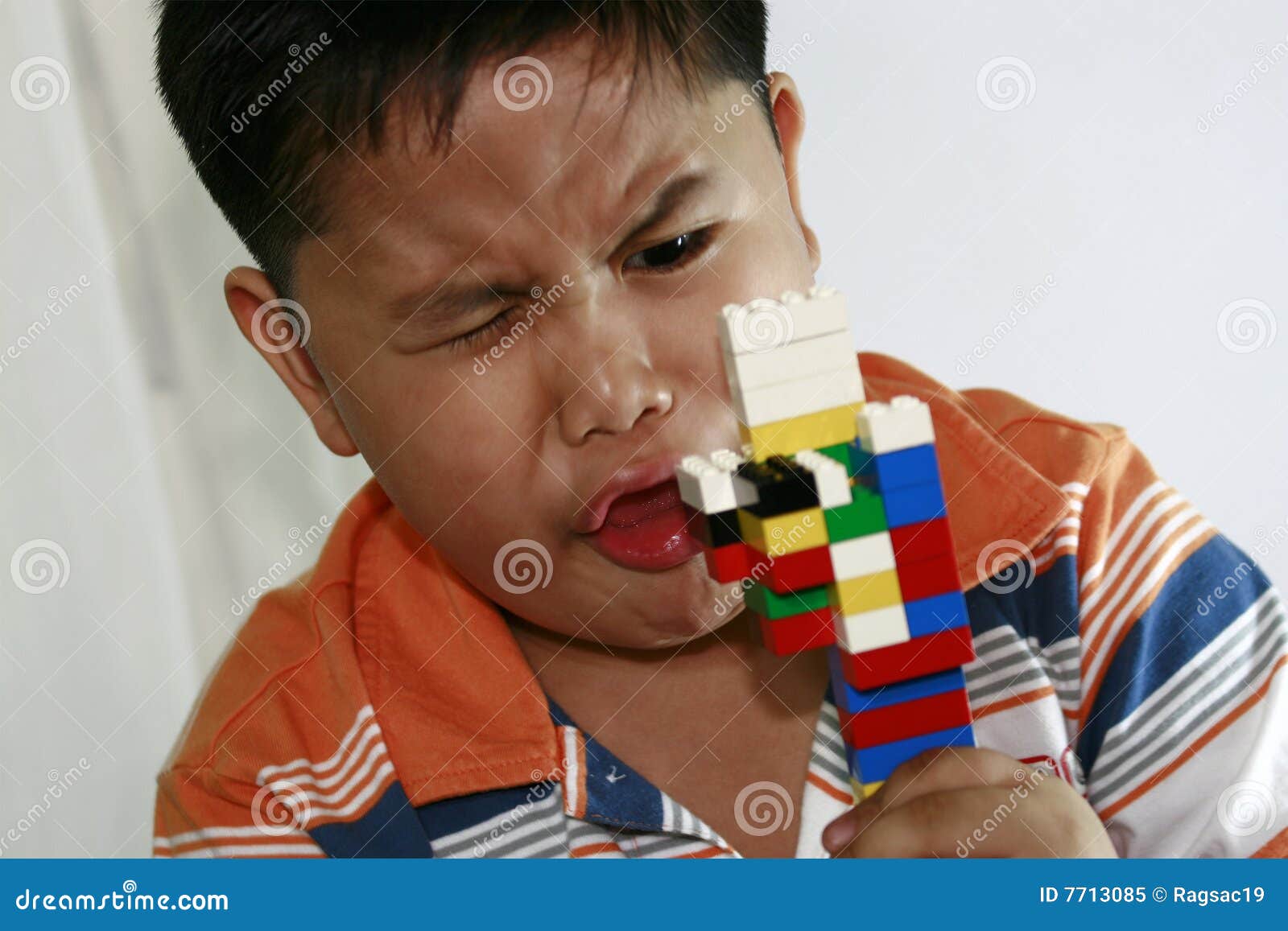 Child Playing Building Blocks Stock Image - Image of learn, colors: 7713085