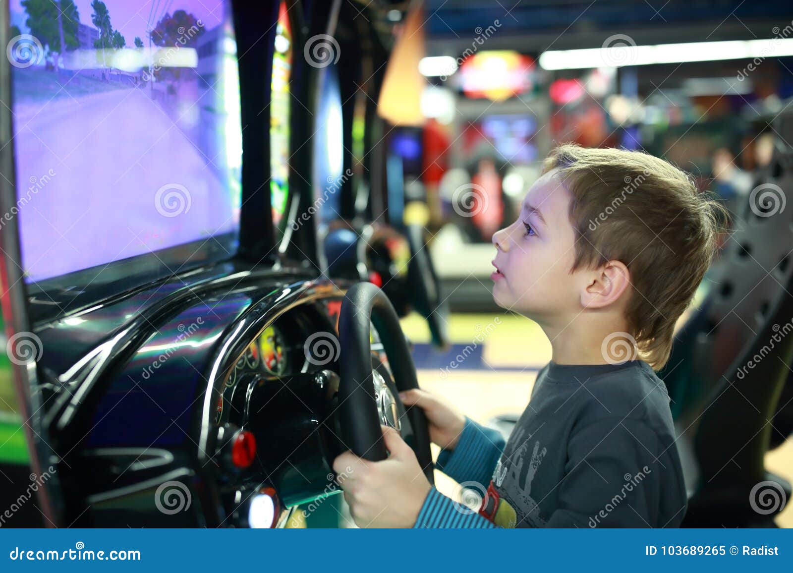 Child Playing in Car Simulator Stock Image Image of machine
