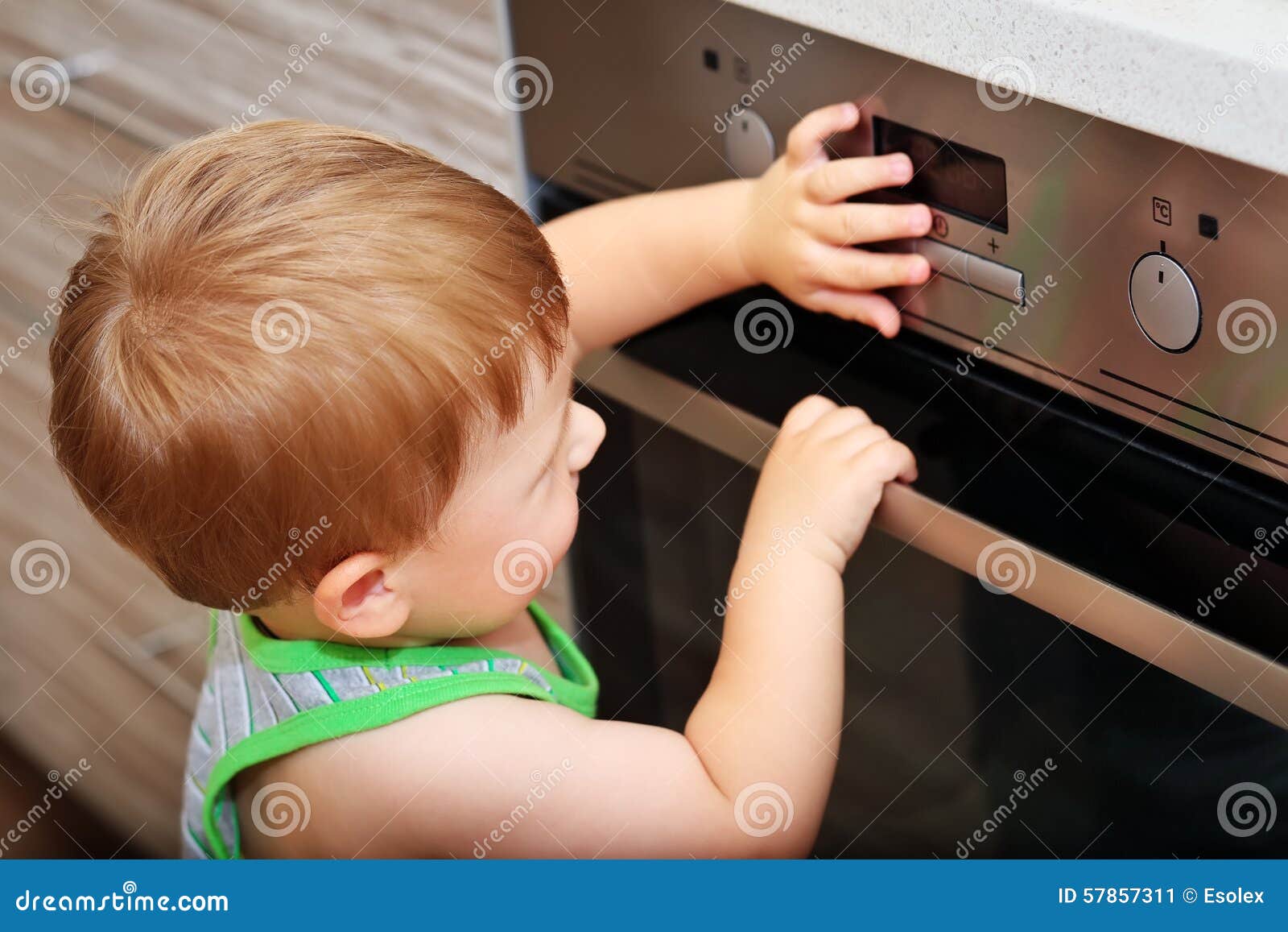 Child Playing with Electric Oven. Stock Image Image of conceptual