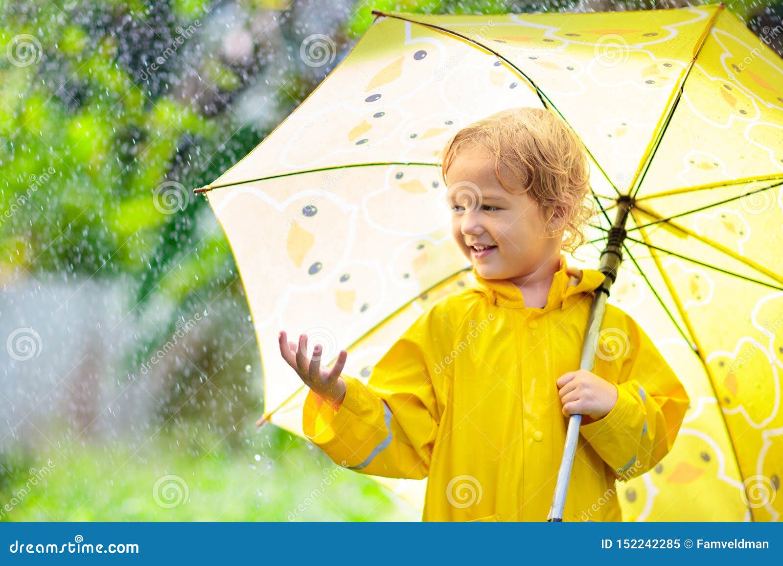 Child Playing in the Rain. Kid with Umbrella Stock Image - Image of ...