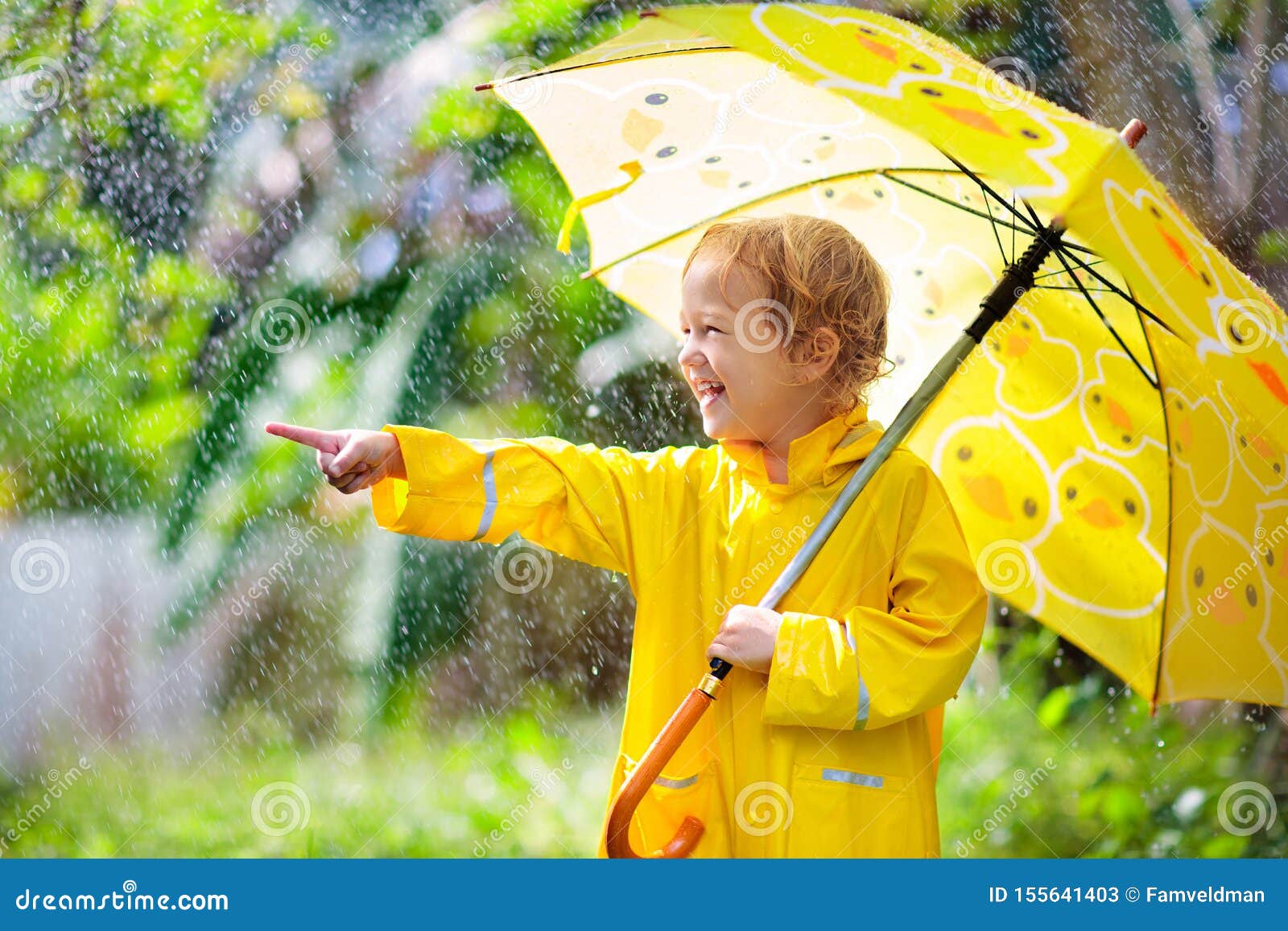 Child Playing in the Rain. Kid with Umbrella Stock Image - Image of ...