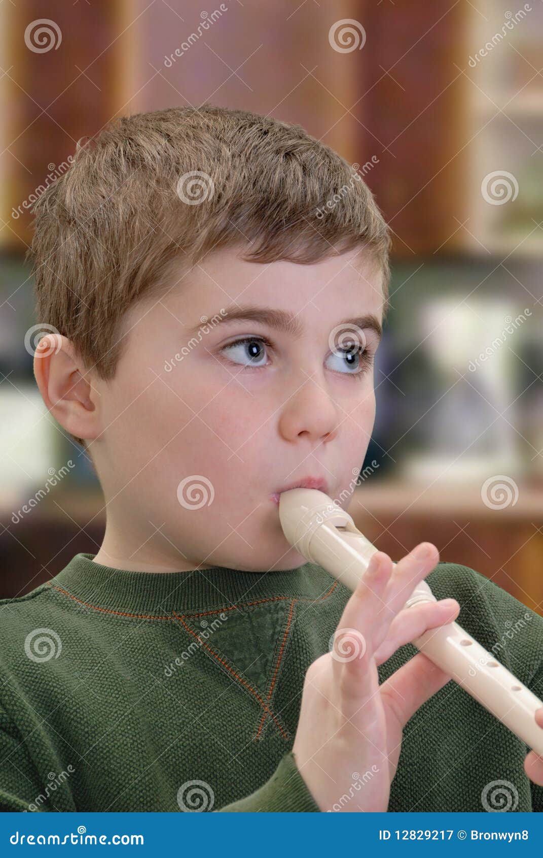 Child Playing Recorder stock image. Image of practicing - 12829217