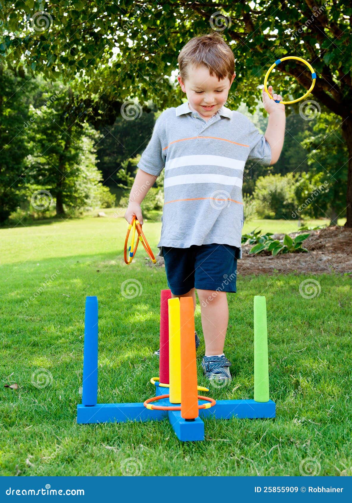 child playing ring toss