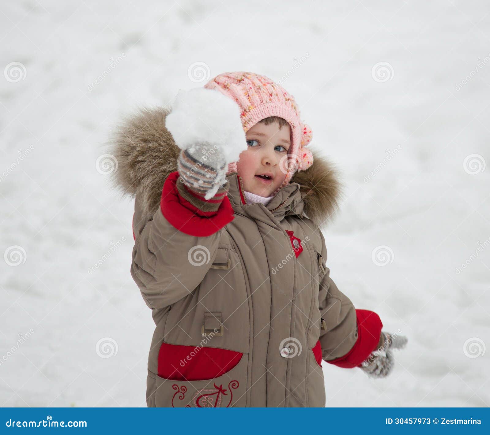 Child Playing with Snowballs Stock Image - Image of play, girl: 30457973