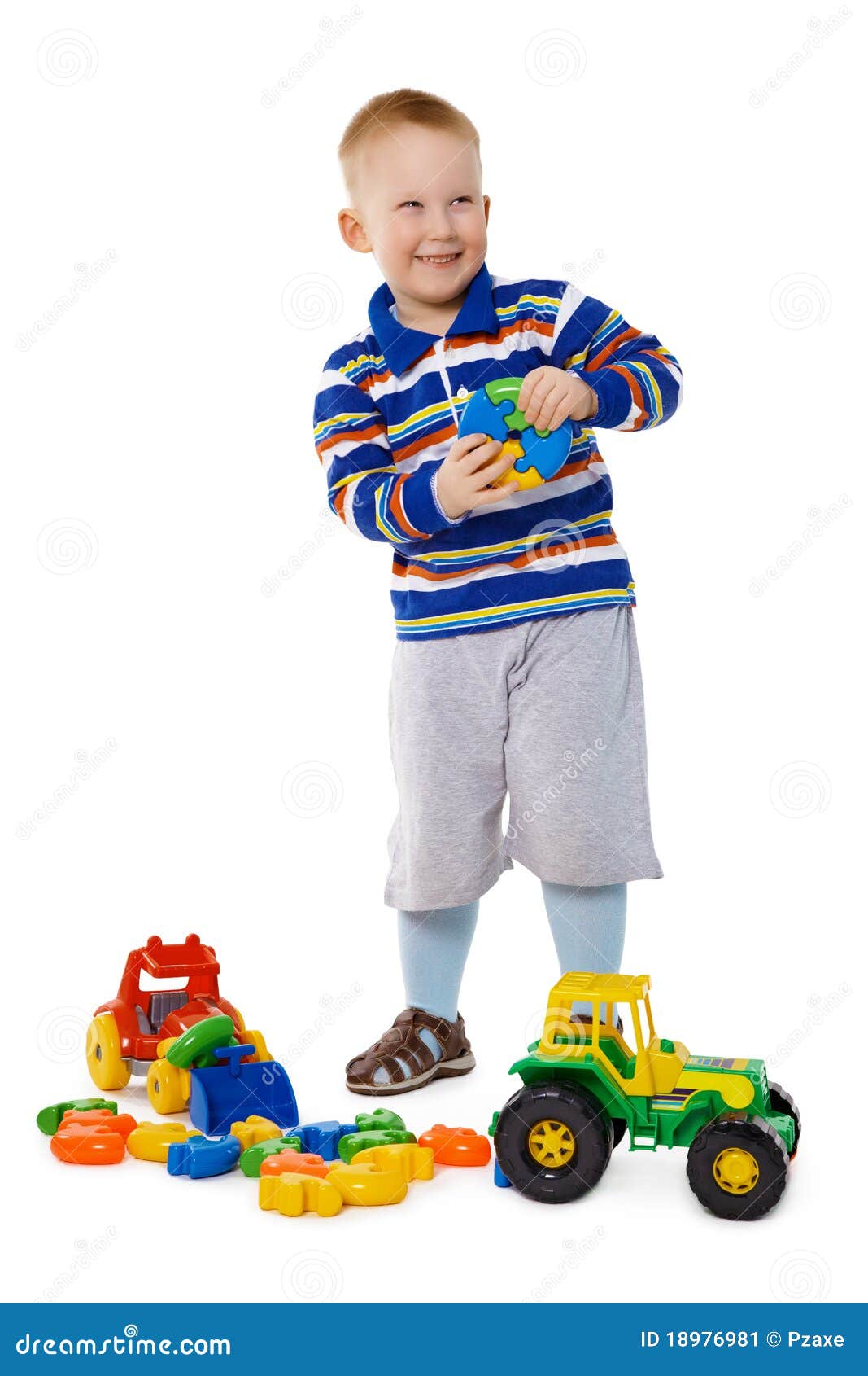 Little Boy Playing with Color Toys on Floor Stock Photo - Image of  bulldozer, little: 19039326