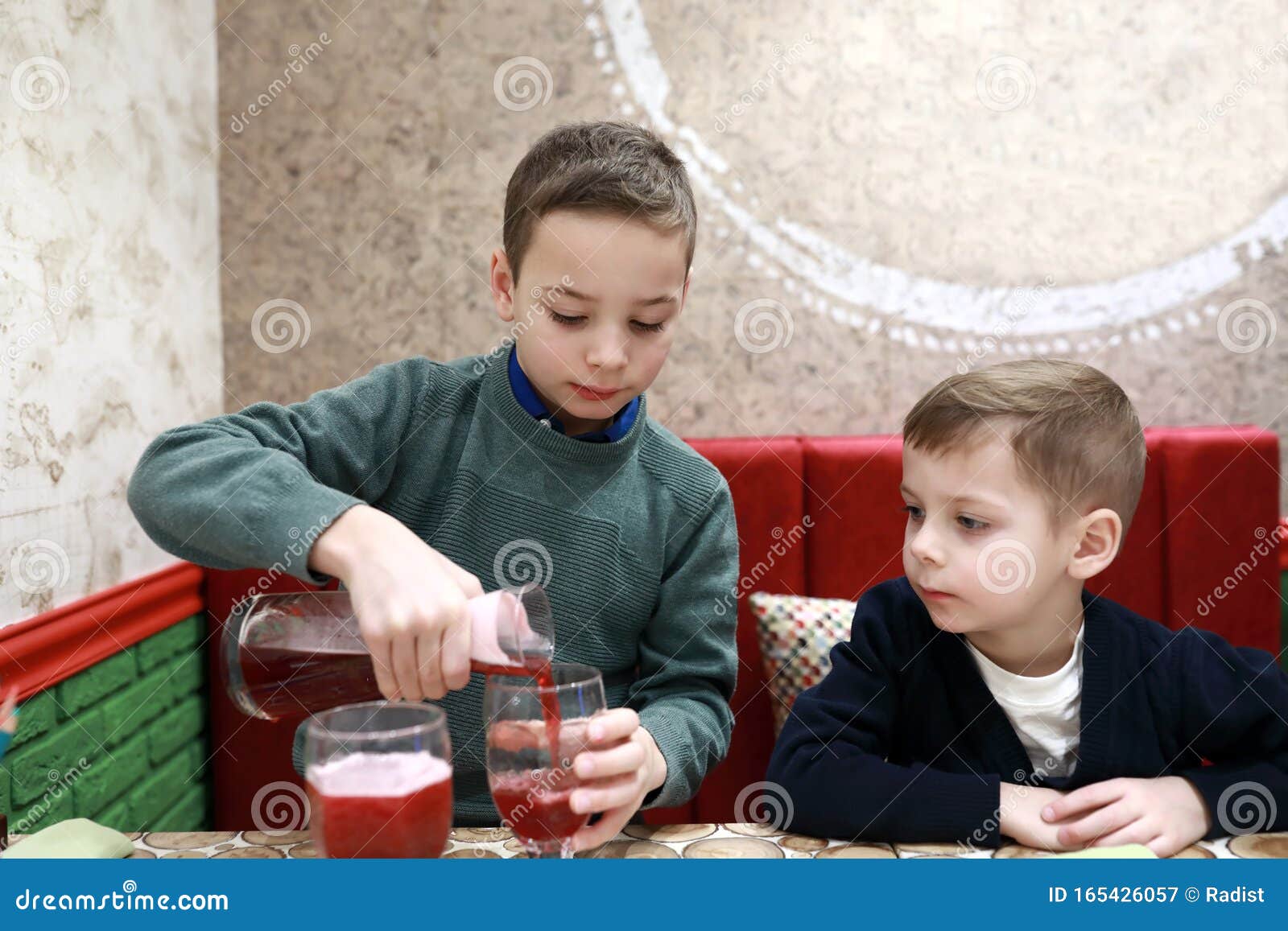 Child Pouring Juice from Decanter Stock Image Image of eating, lunch