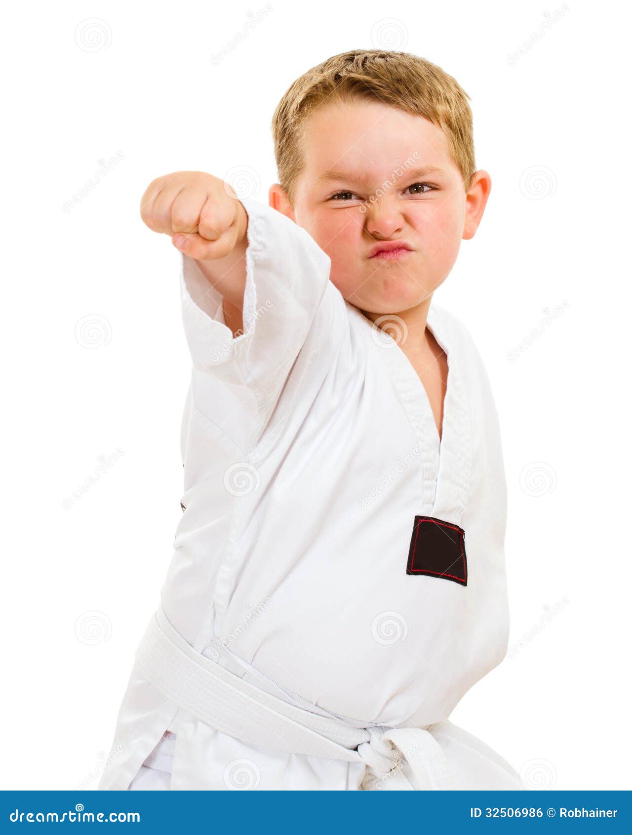 Child Practicing His Taekwondo Moves Isolated White 32506986 