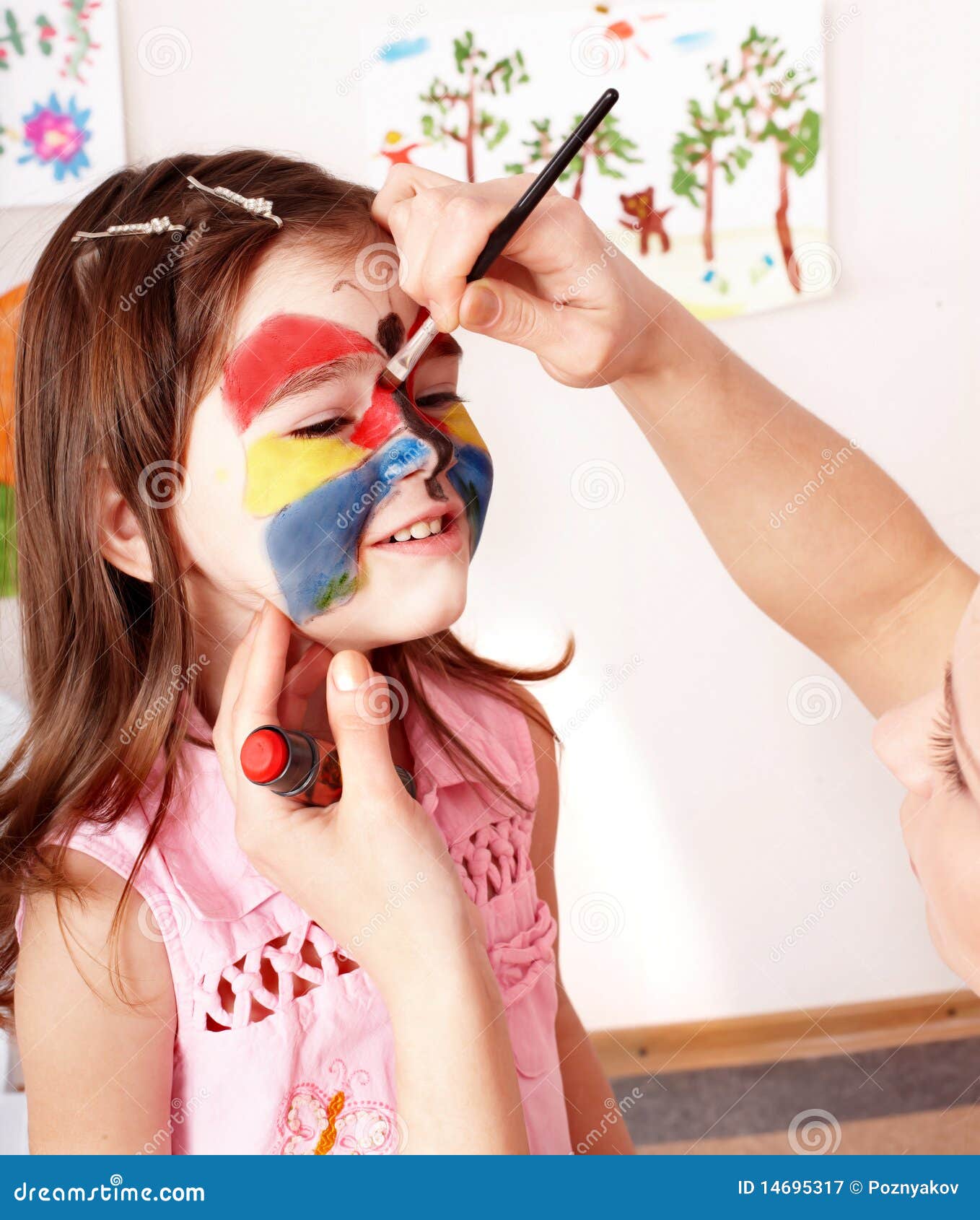 child preschooler with face painting.