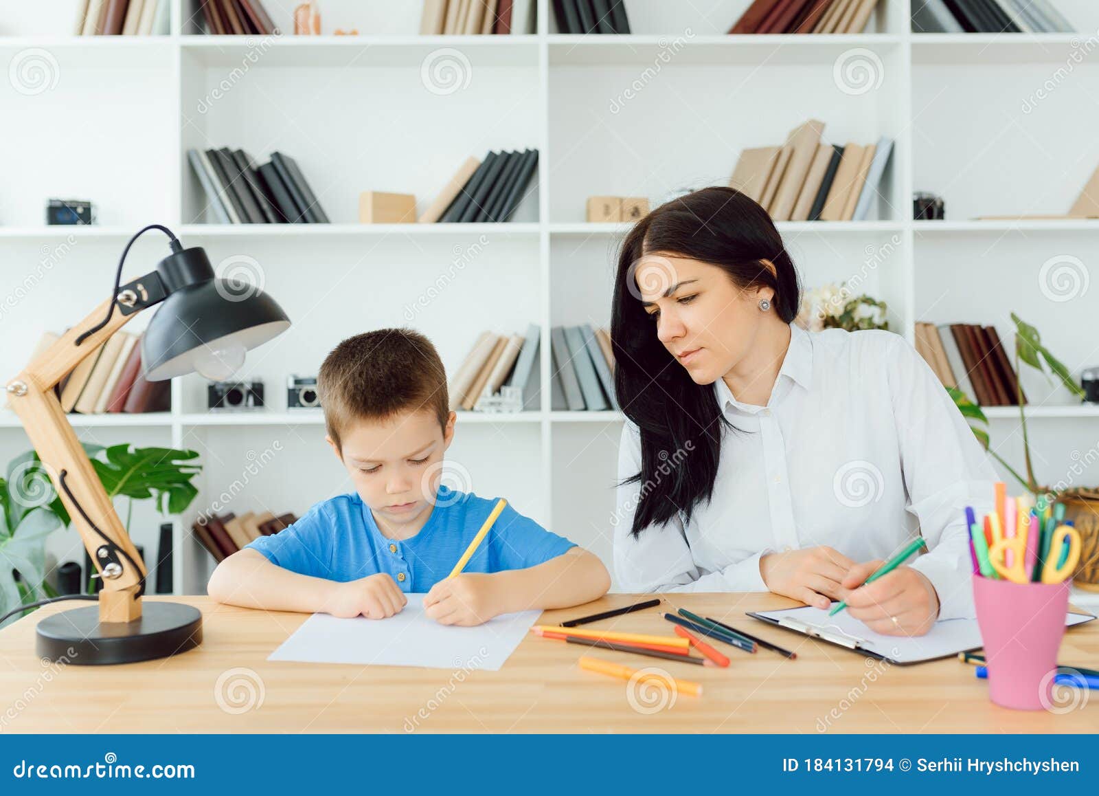 Child Psychologist Working with Boy in Office Stock Photo Image of