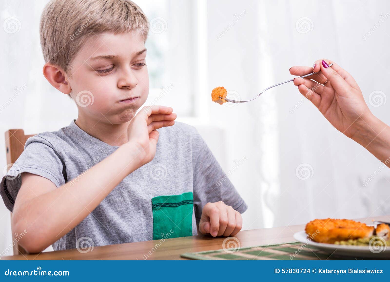 Child Refusing To Eat Dinner Stock Photo - Image of disgust, distaste