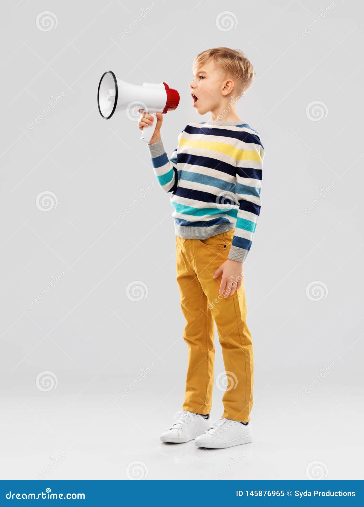 little boy speaking to megaphone