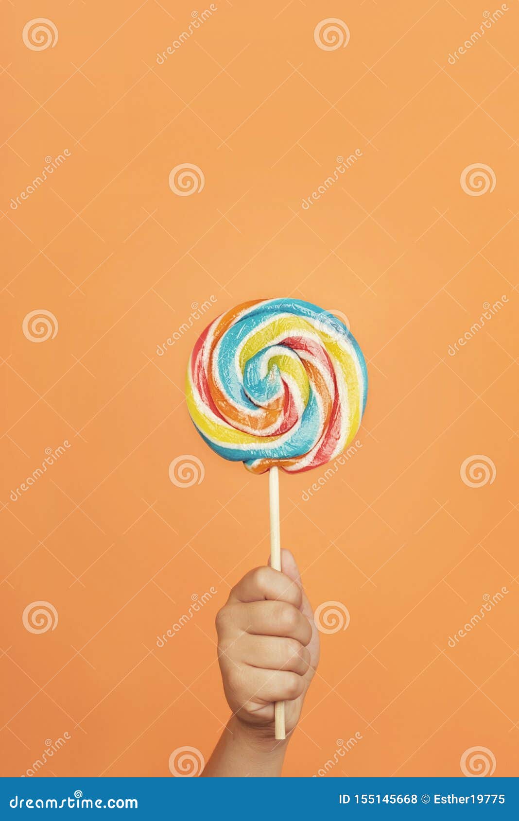 Child`s Hand with Colorful Lollipop Stock Photo - Image of party, hold ...