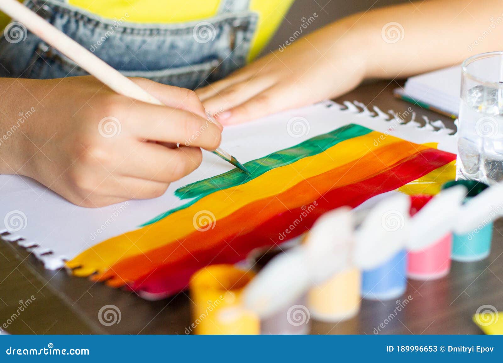 Child`s Hand Draw Painting Colorful Rainbow Selective Focus Stock