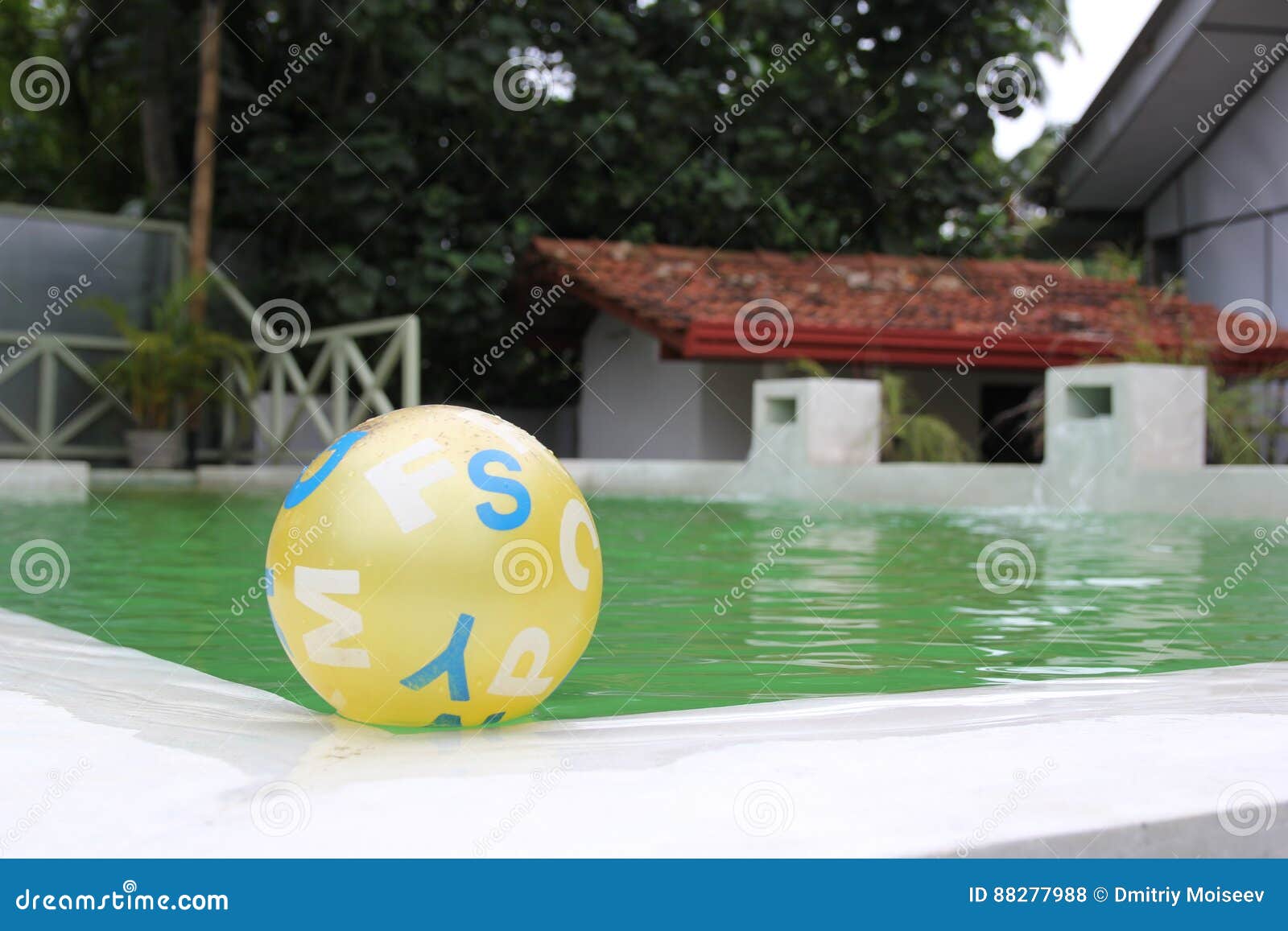 Child`s Yellow Ball Floating in Pool Stock Photo Image of relax, blue