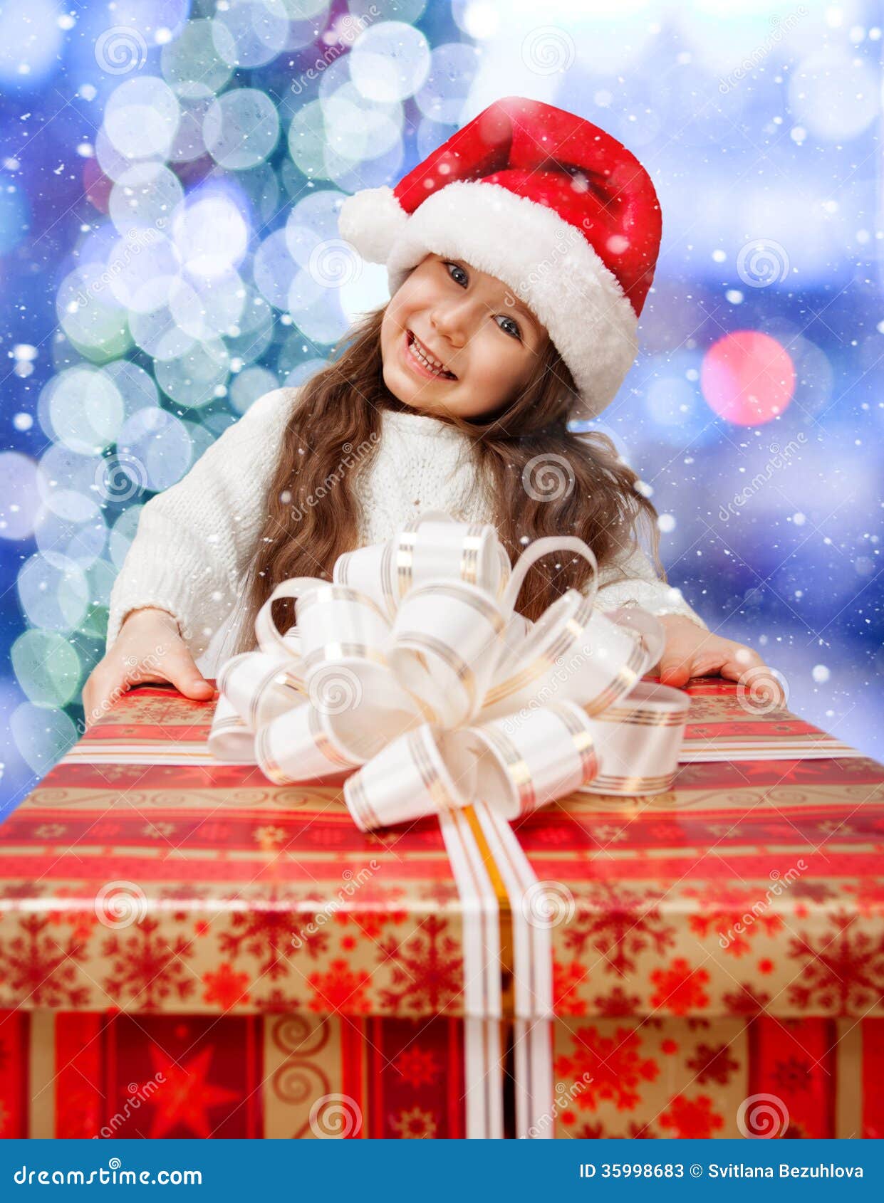 Child in Santa Hat with Gift Box. Stock Image Image of holiday